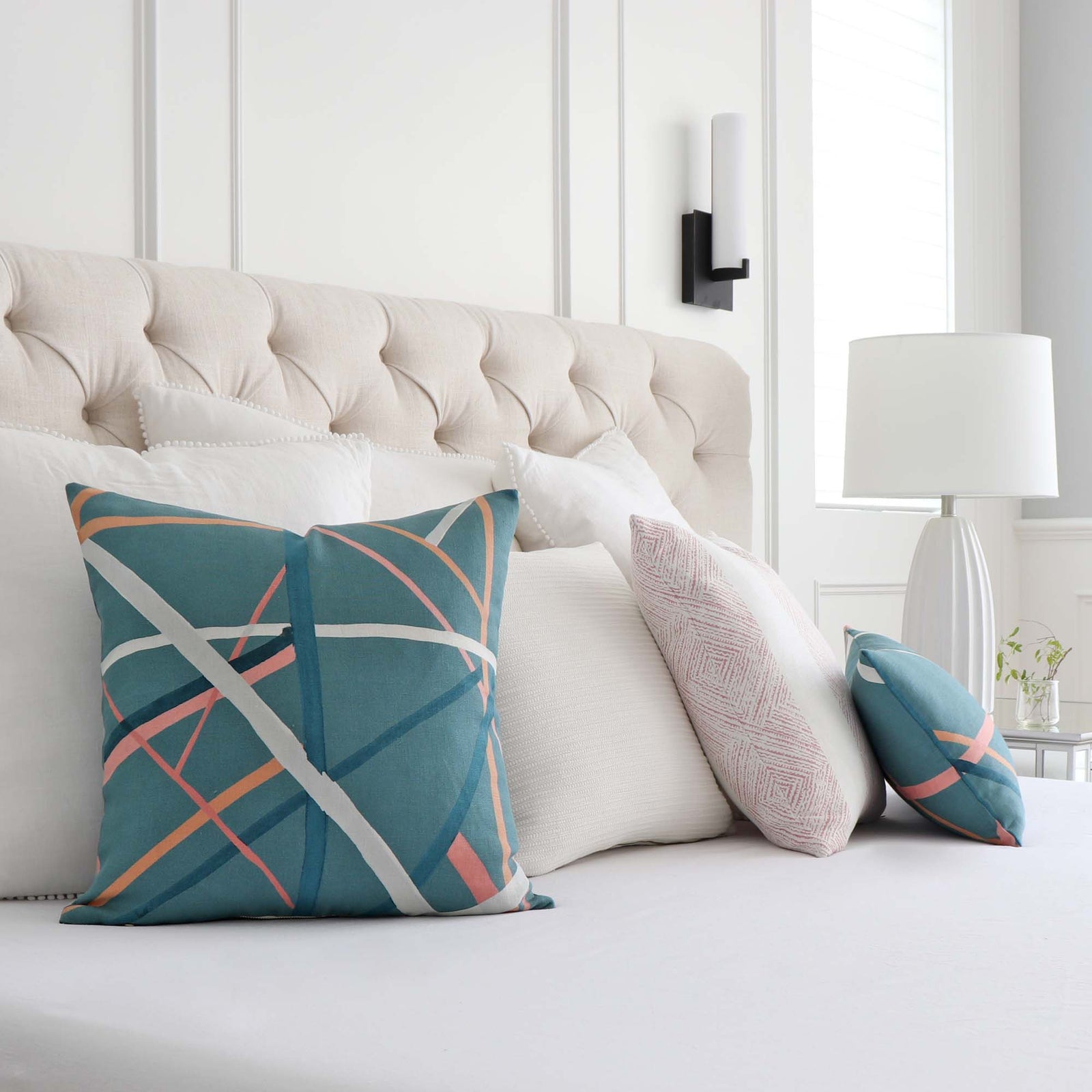 Kelly Wearstle Simpatico Teal Blue Striped Designer Decorative Throw Pillow Cover on King Bed with Coordinating Throw Pillows