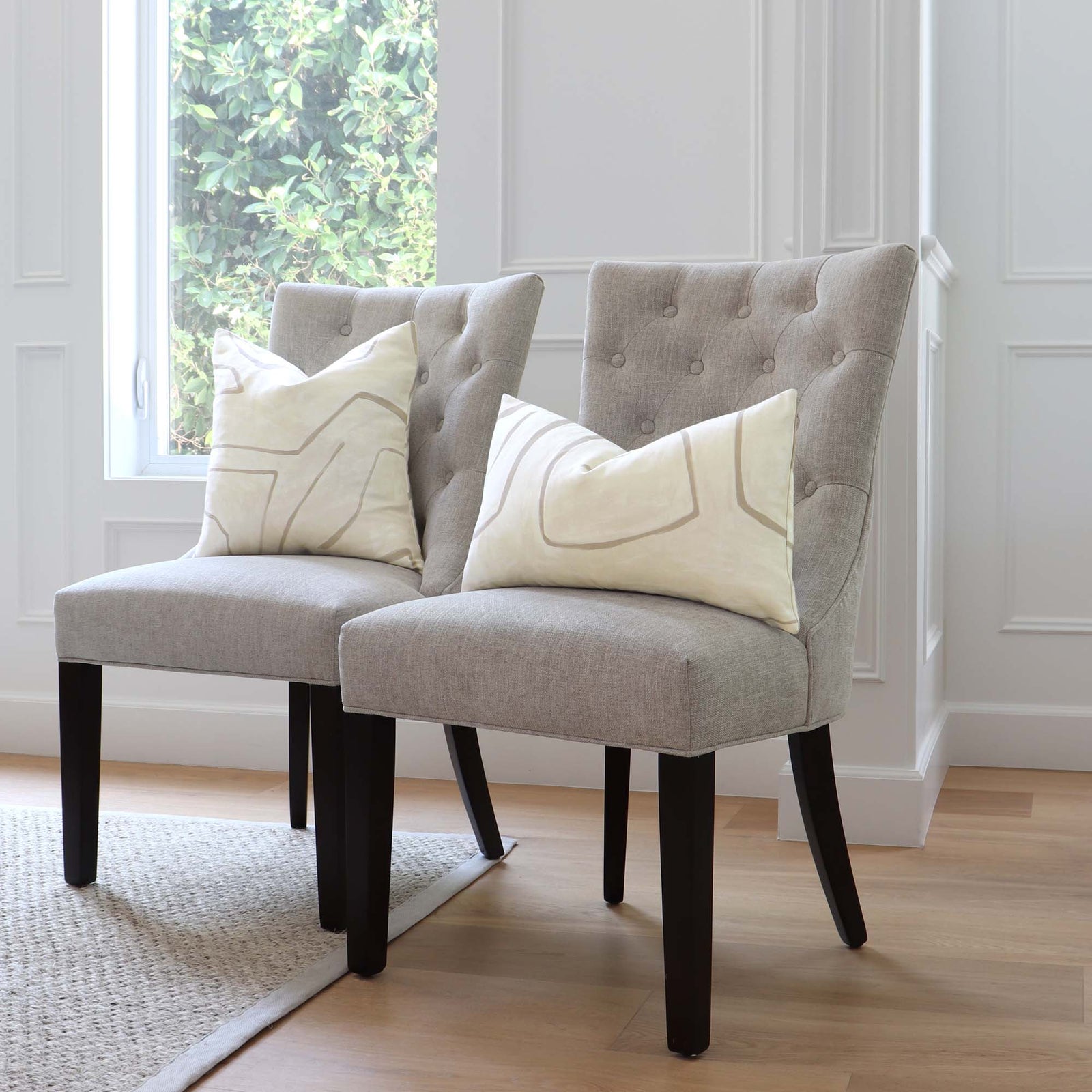 Kelly Wearstler Graffito Parchment Contemporary Designer Throw Pillow Cover on Chairs in Home Decor