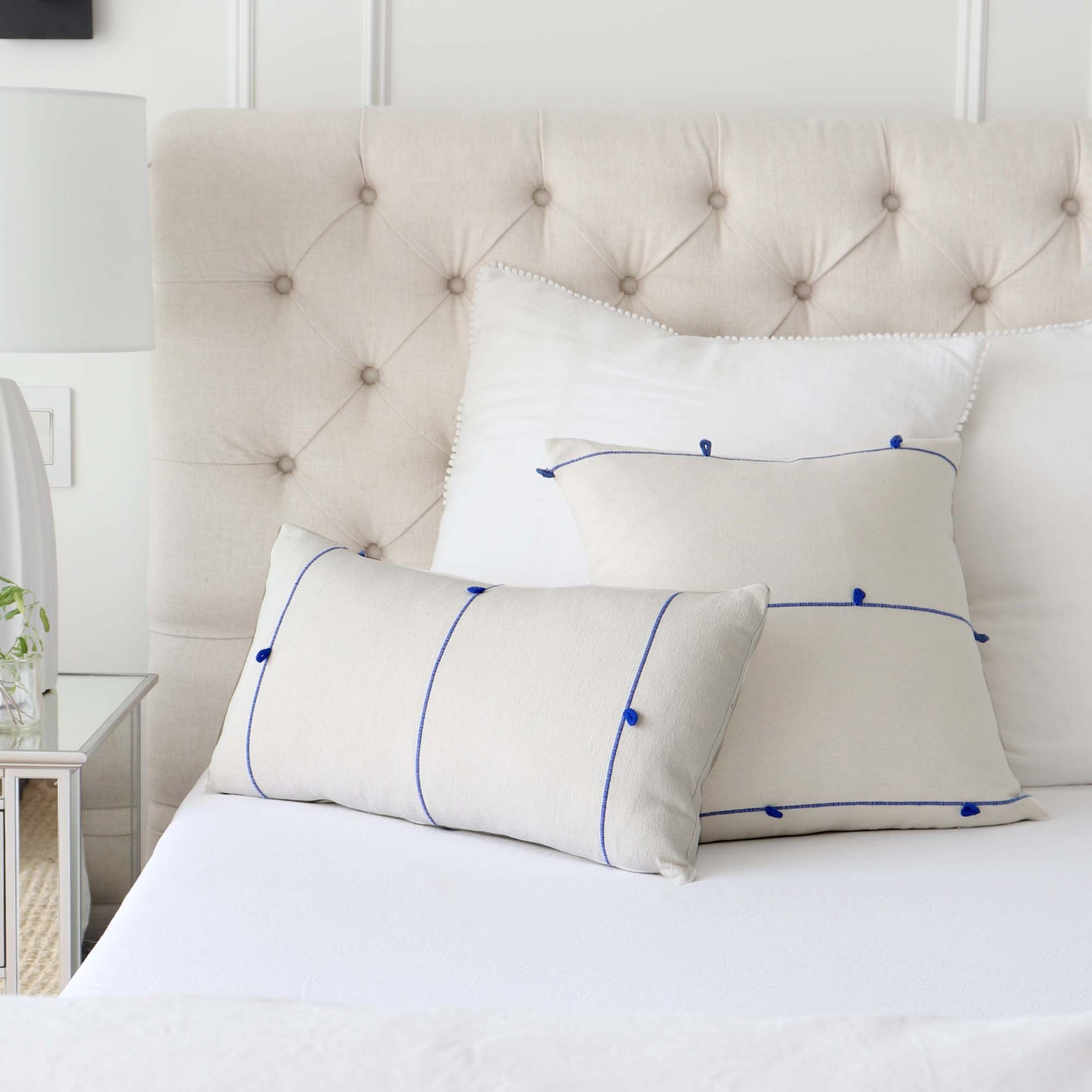 Schumacher Globo Knotted Handwoven Royal Blue Designer Textured Throw Pillow Cover on King Bed with White Euro Pillows