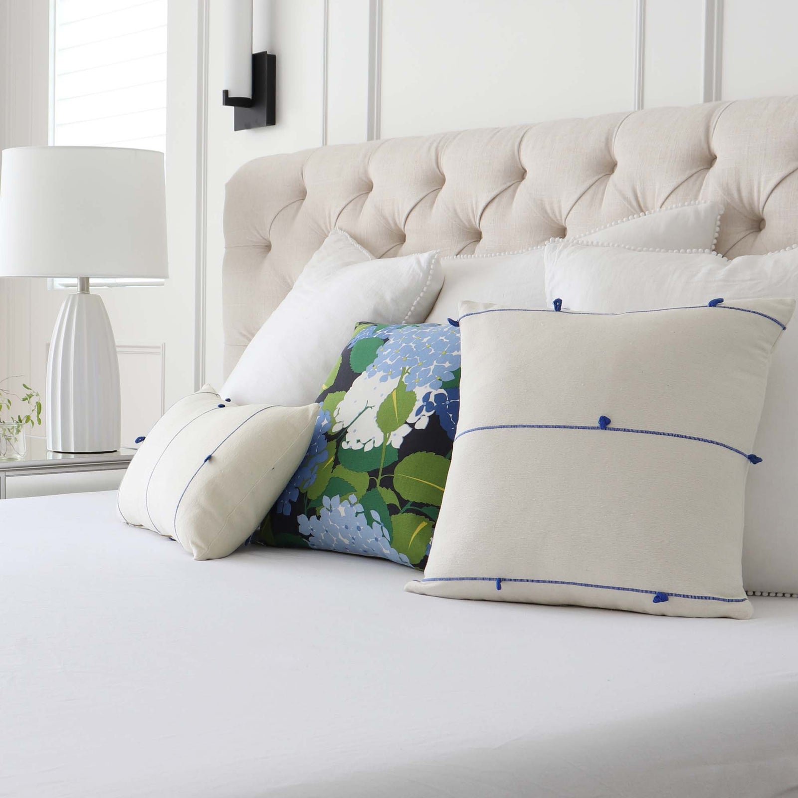 Schumacher Globo Knotted Handwoven Royal Blue Designer Textured Throw Pillow Cover with Complementing Throw Pillow in Bedroom