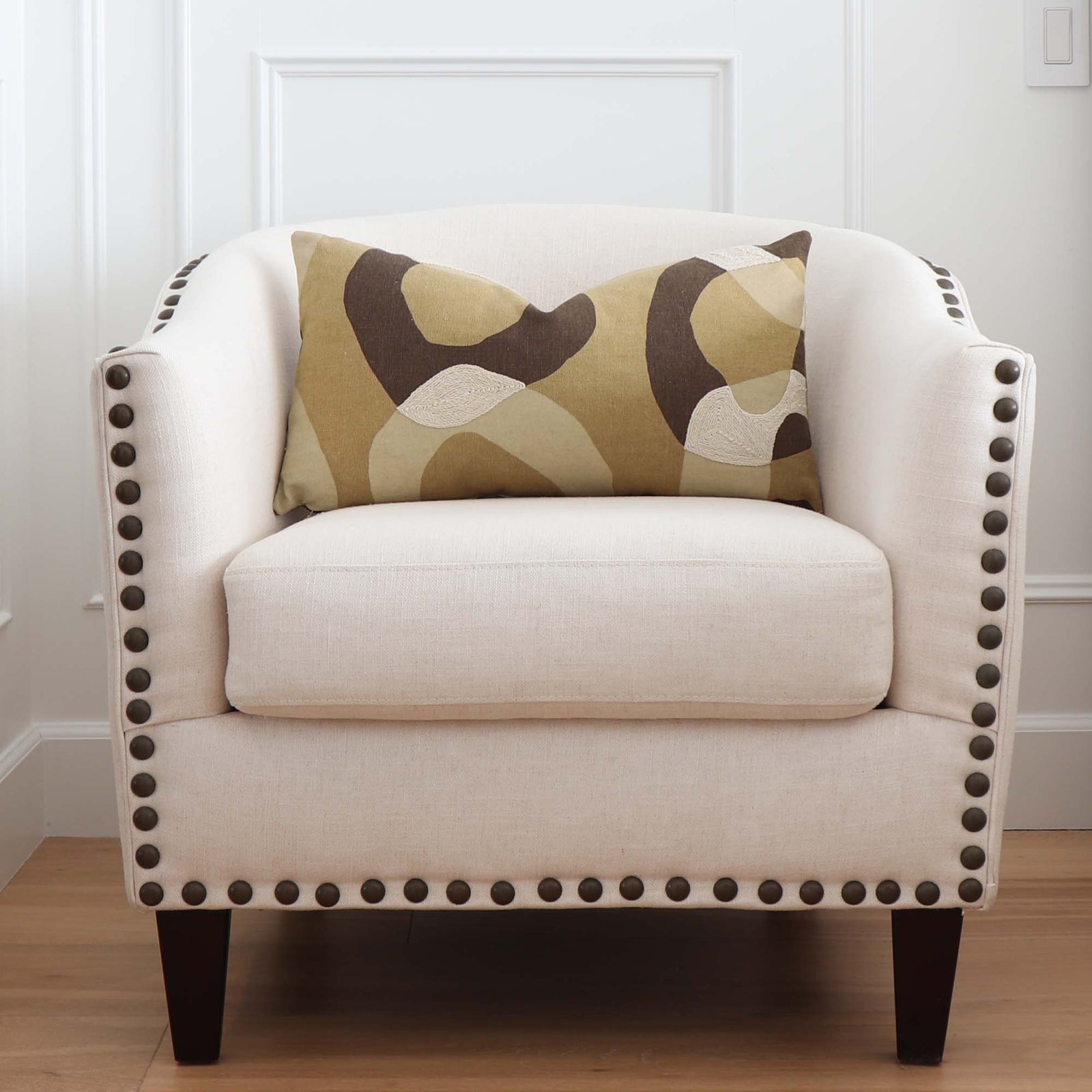 Schumacher Conrad Embroidered Ochre Brown Designer Luxury Throw Pillow Cover on Accent Chair