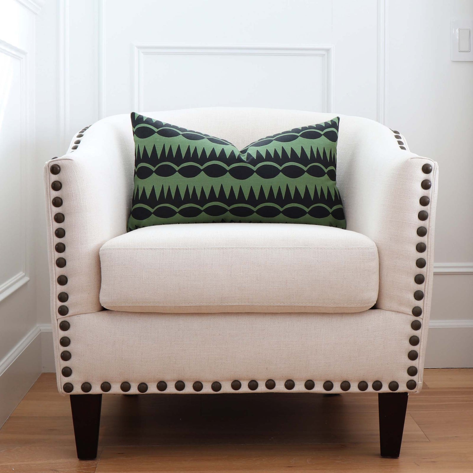 Schumacher Dagger Stripe Green Geometric Stripe Designer Throw Pillow Cover on Accent Chair