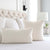 Schumacher Globo Knotted Handwoven Natural White Designer Textured Throw Pillow Cover in Bedroom
