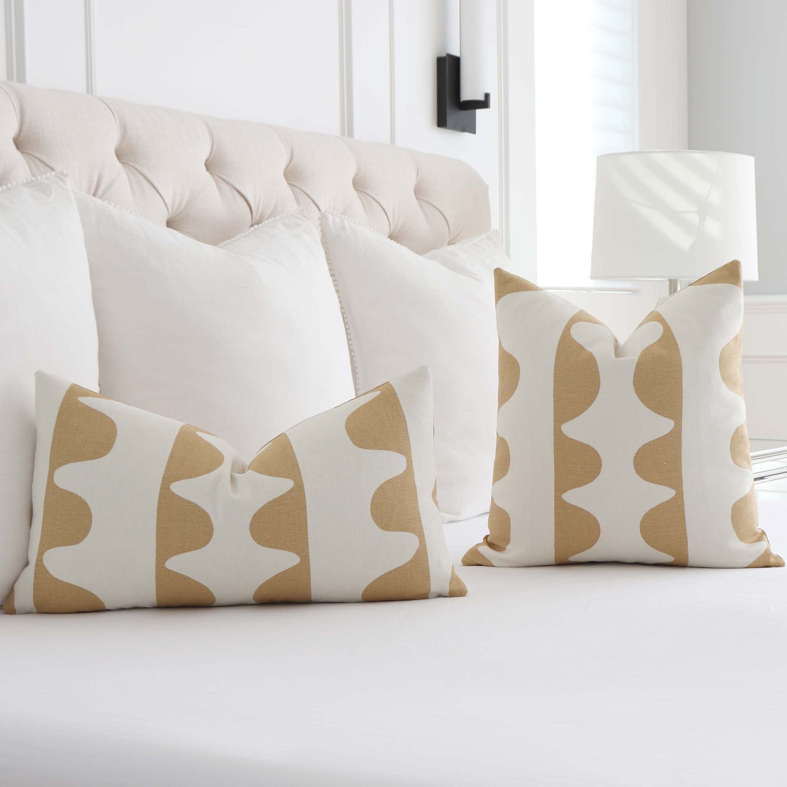 Schumacher Hadiya Williams Drift Ginger Hand Printed Geometric Stripe Luxury Designer Throw Pillow Cover on Bed in Bedroom