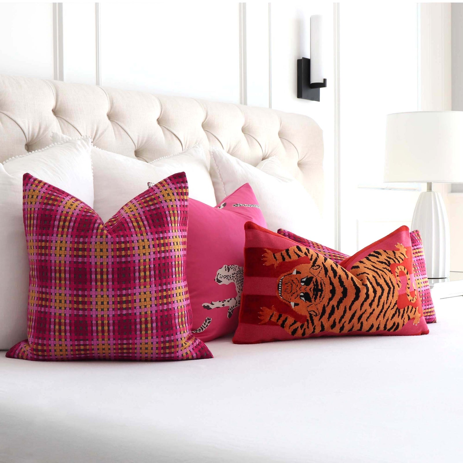 Scalamandre Twiggy Cherry Blossom Pink Red Yellow Checkered Striped Woven Gradient Designer Luxury Throw Pillow Cover on Bed with Coordinating Throw Pillows