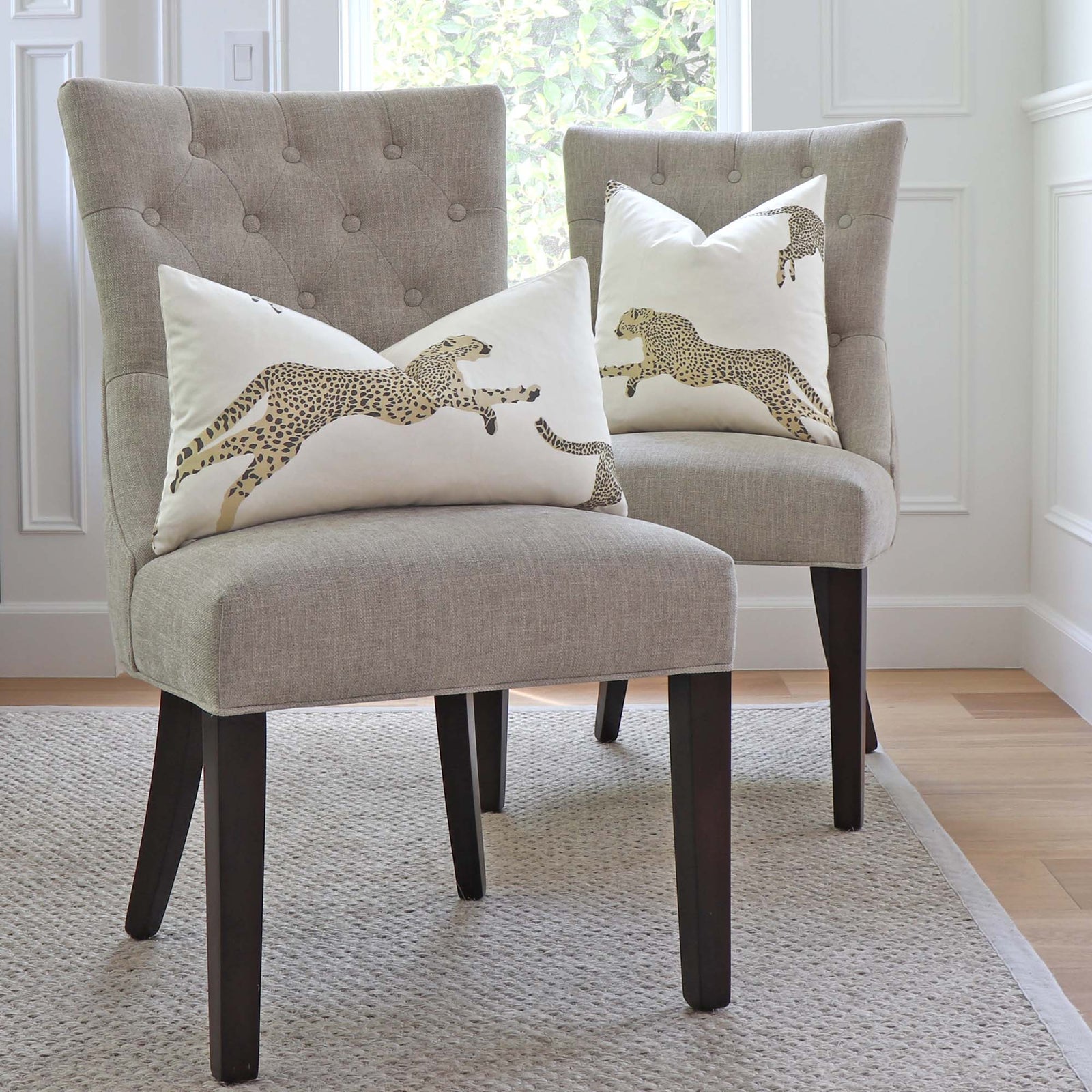 Scalamandre Leaping Cheetah Dune Beige Animal Print Designer Decorative Throw Pillow Cover on Dining Chairs