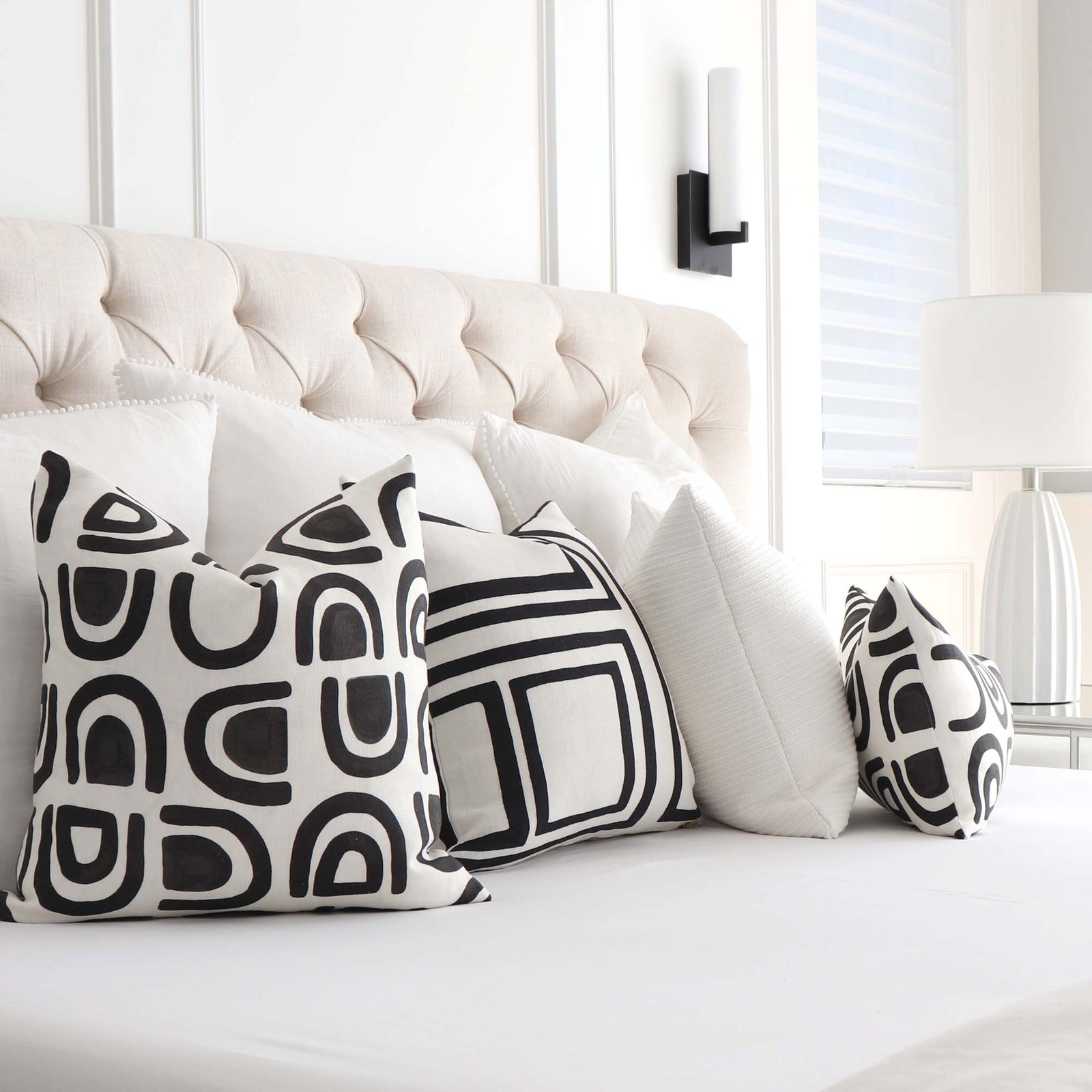 Schumacher Hidaya Williams Threshold Carbon Black Graphic Print Linen Decorative Throw Pillow Cover in Bedroom with Matching Throw Pillows