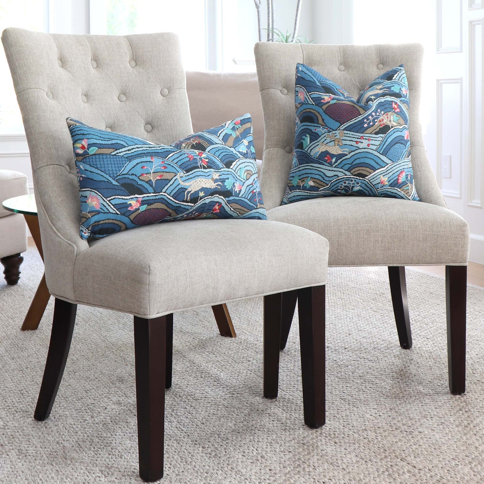 Schumacher Rolling Hills Blue Designer Throw Pillow Cover on Dining Chairs in Home Living Room