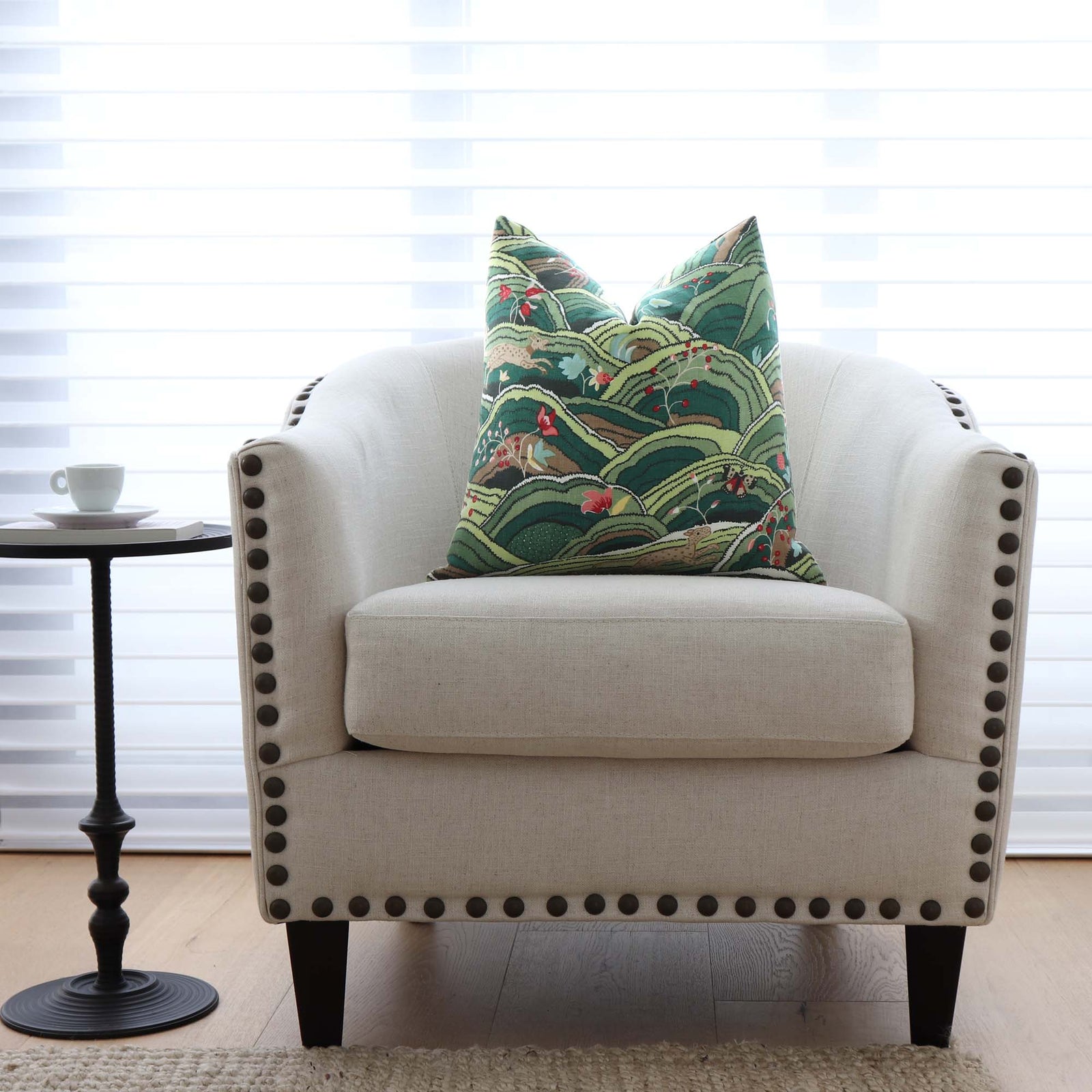 Schumacher Rolling Hills Green Luxury Designer Throw Pillow Cover on Arm Chair with Nail Heads