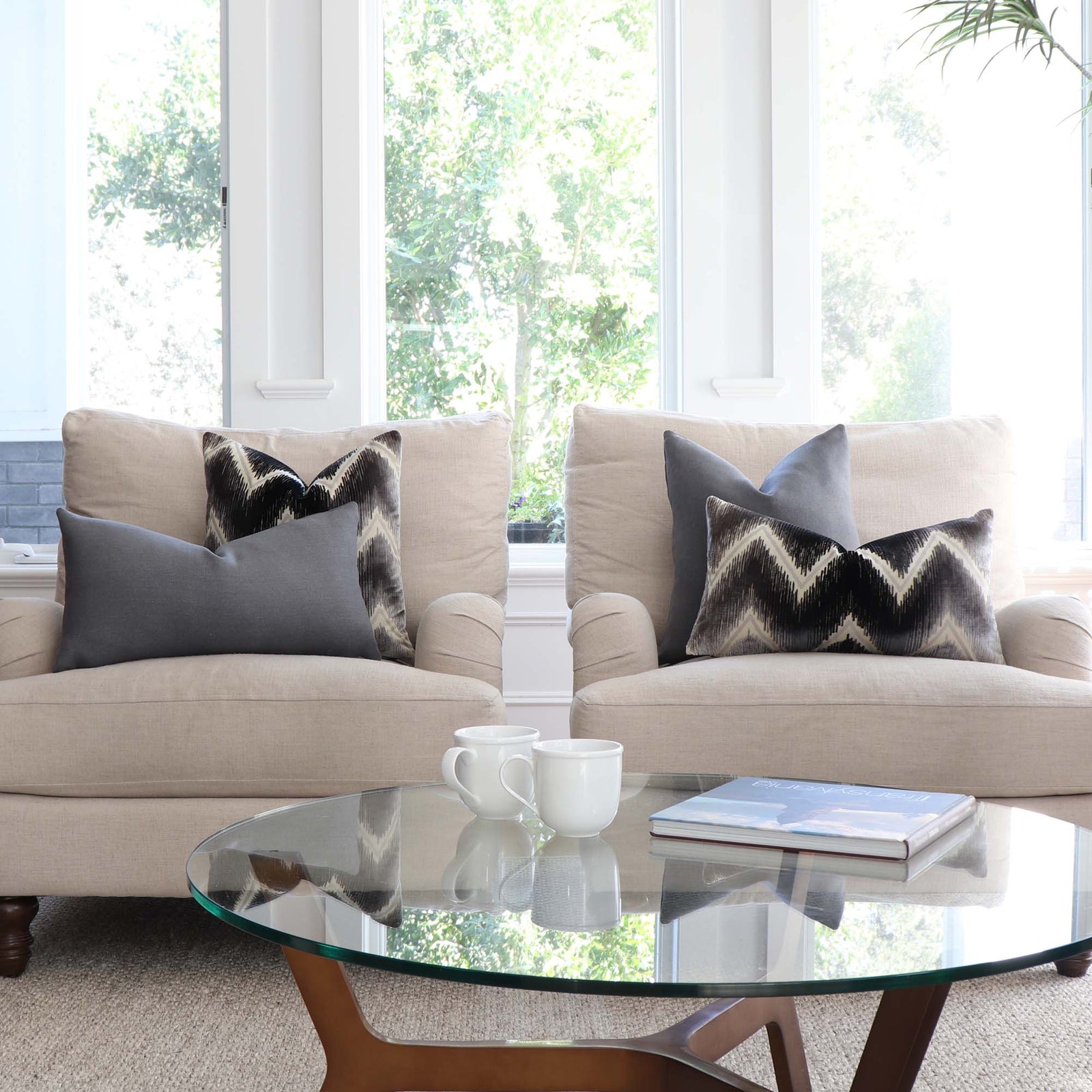 Schumacher Shock Wave Velvet Platinum Black Designer Throw Pillow Cover on Arm Chairs with Gray Linen Pillows