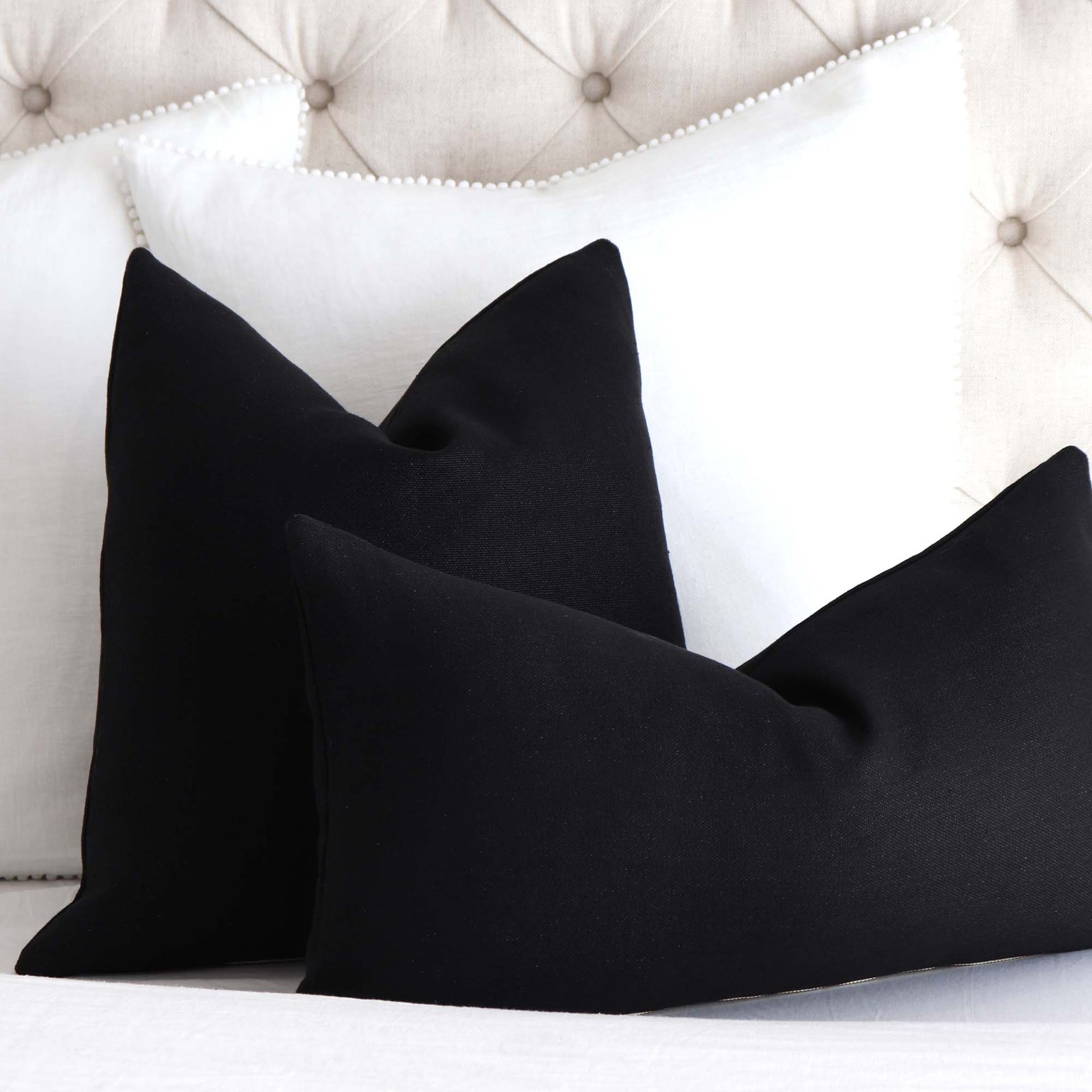 Tay Solid Black Linen Throw Pillow Cover in Bedroom