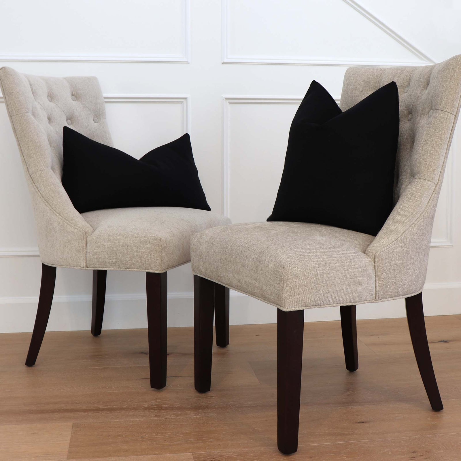 Tay Solid Black Linen Throw Pillow Cover on Chair in Home