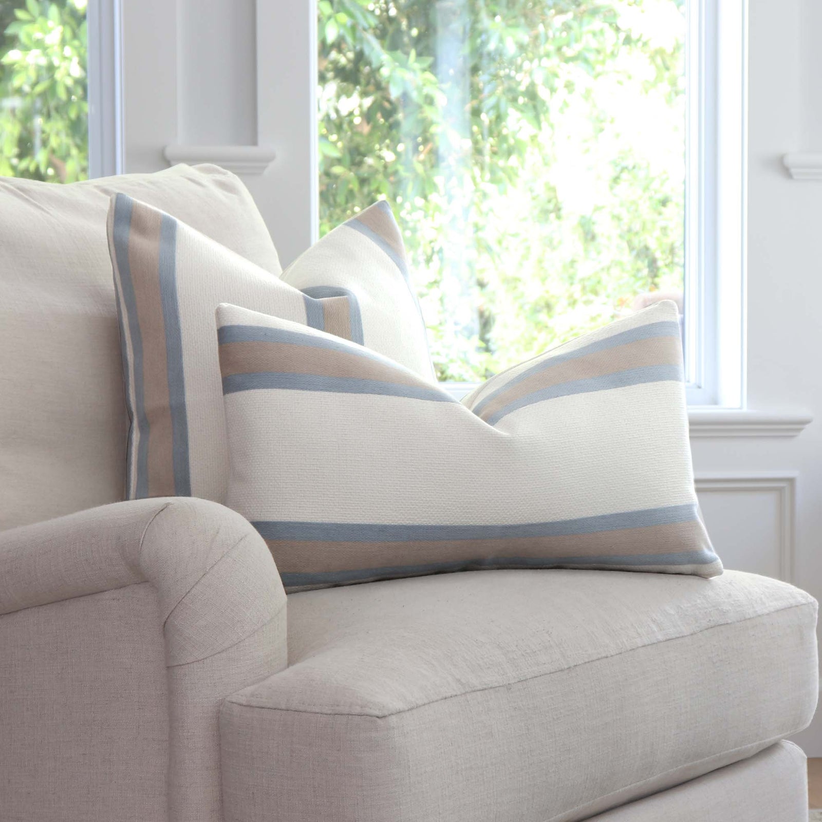 Thibaut Abito Powder Blue Stripe Designer Luxury Throw Pillow Cover on Accent Beige Chair in Home Decor