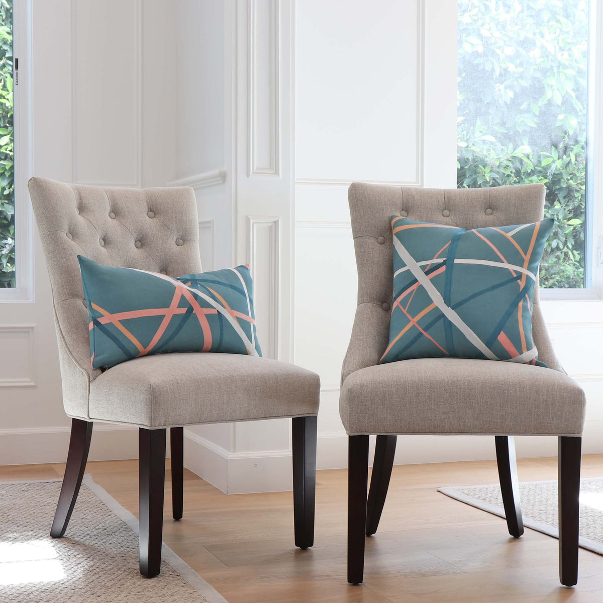 Kelly Wearstle Simpatico Teal Blue Striped Designer Decorative Throw Pillow Cover on Chairs in Home Decor