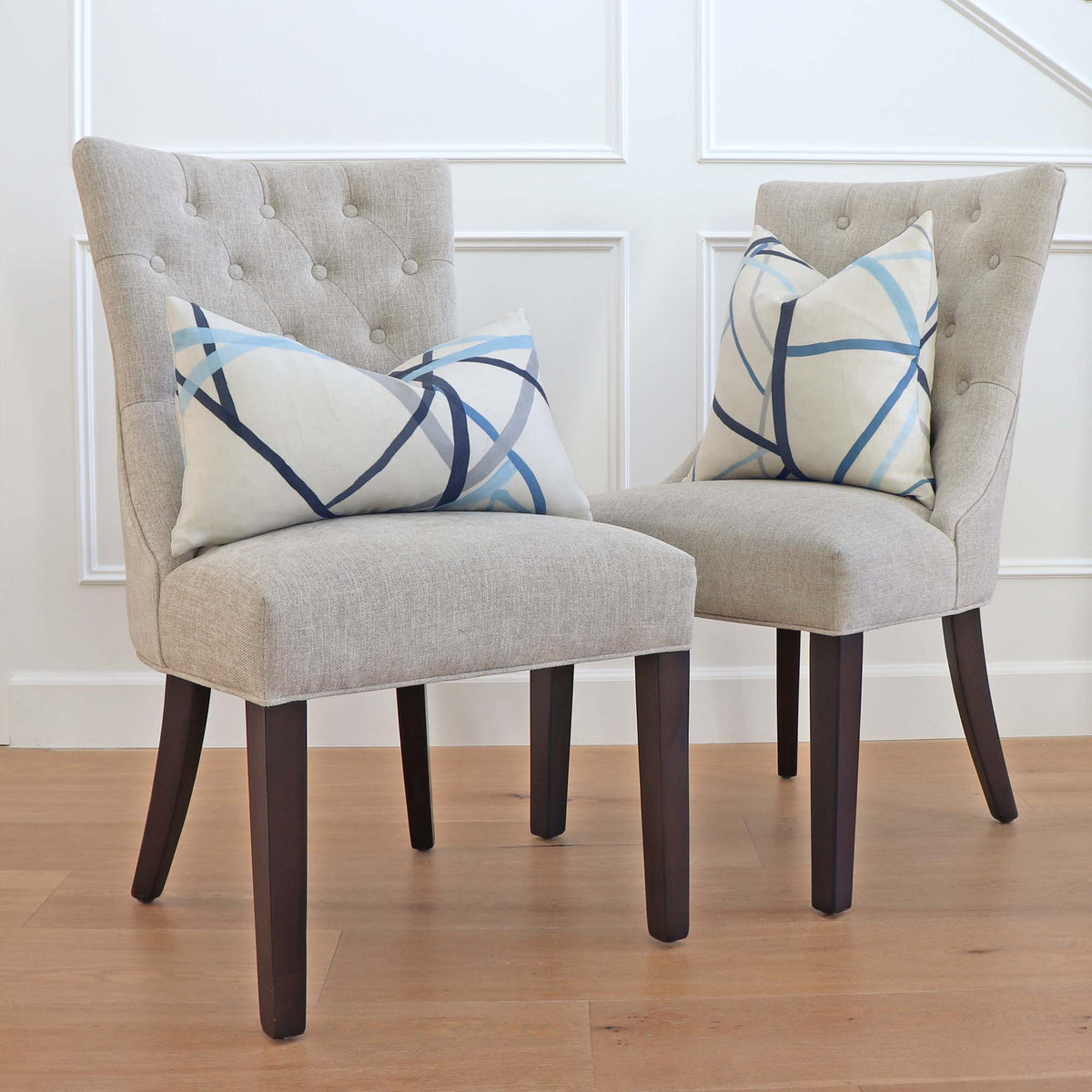 Kelly Wearstler Simpatico Sky Blue Striped Designer Throw Pillow Cover on Dining Armless Chairs