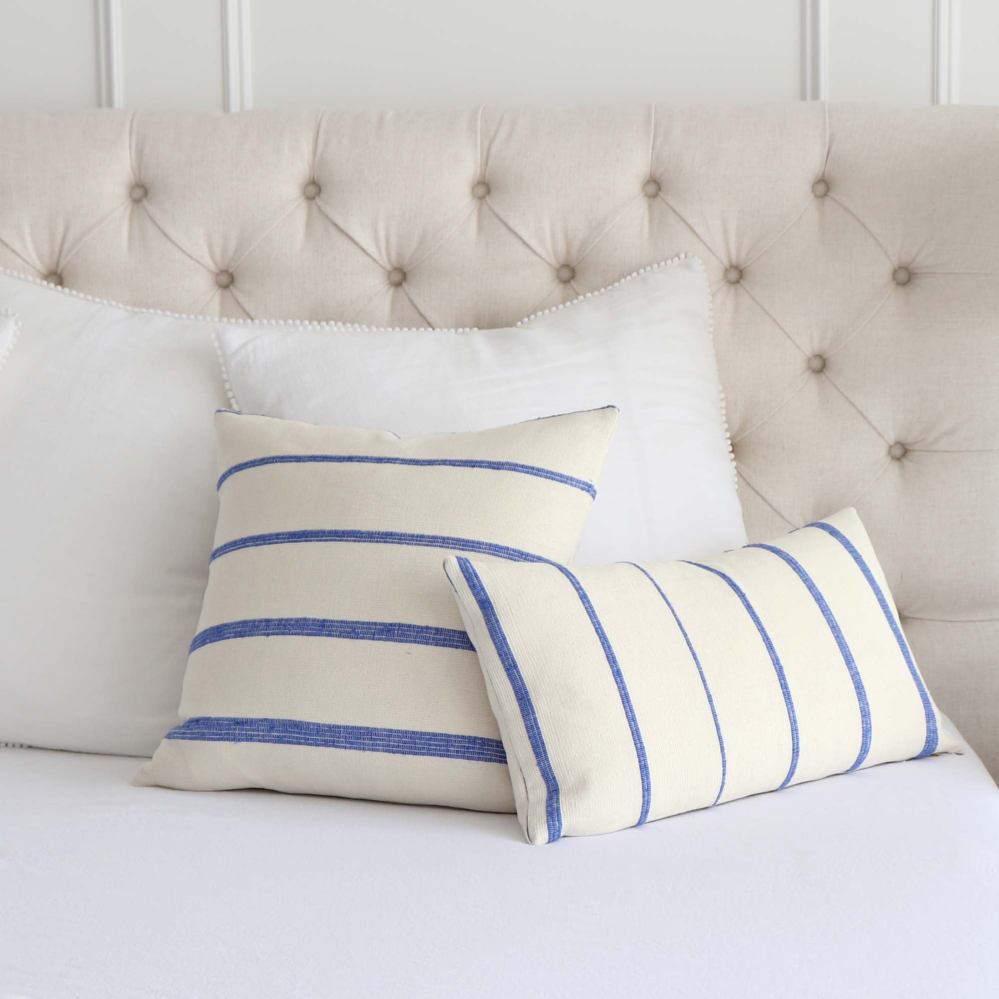 https://www.chloeandolive.com/cdn/shop/files/Schumacher-Cambaya-Handwoven-Stripe-Blue-81391-Designer-Textured-Throw-Pillow-Cover_scenic_bed_5000x.jpg?v=1683848183