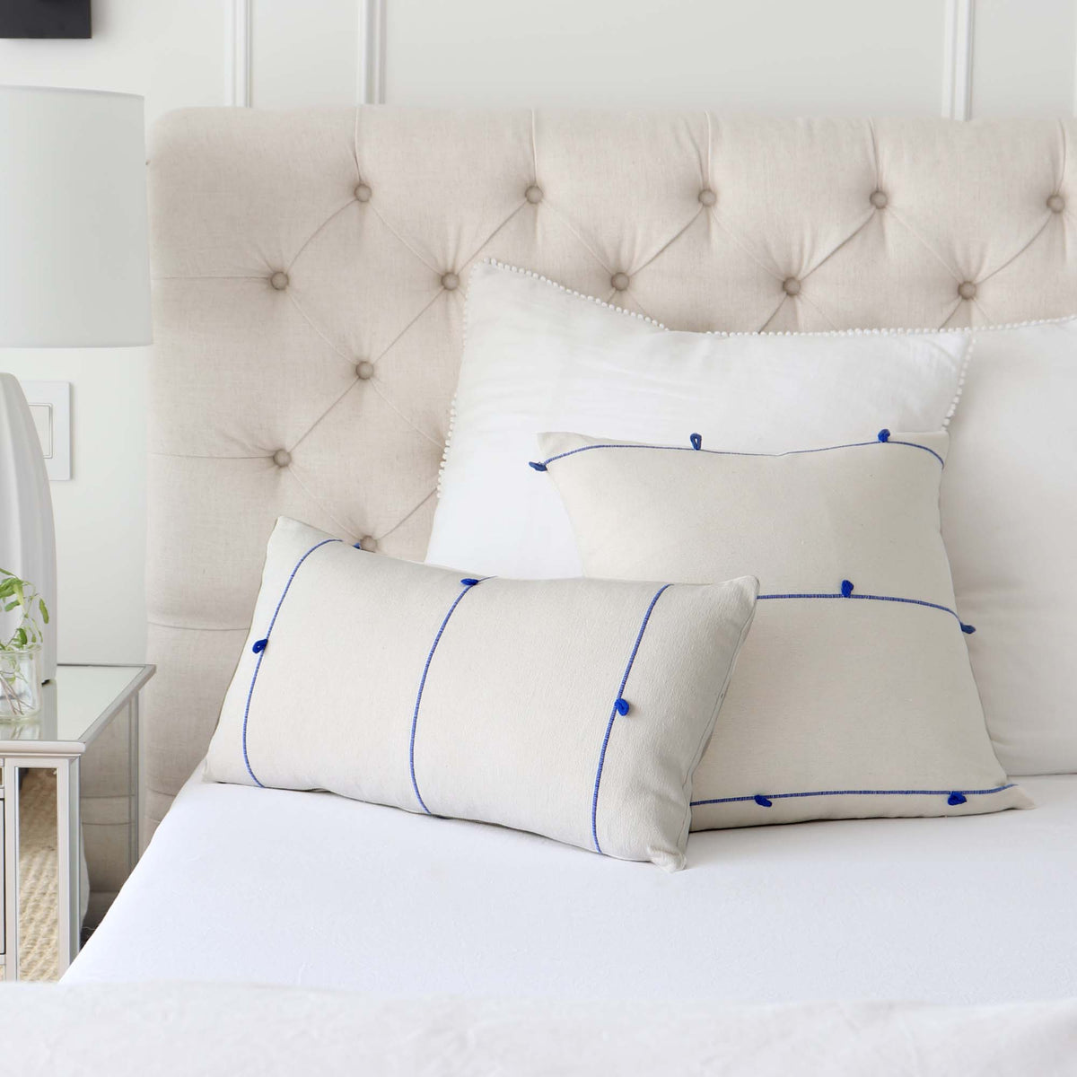 Schumacher Globo Knotted Handwoven Royal Blue Designer Textured Throw Pillow Cover on King Bed with White Euro Pillows