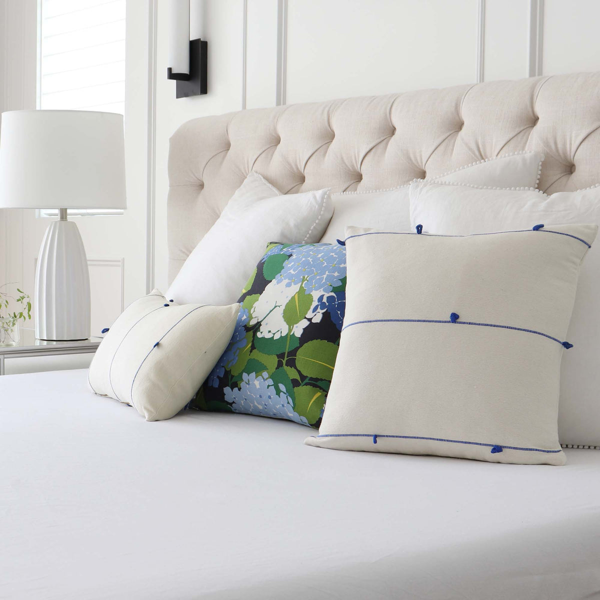 Schumacher Globo Knotted Handwoven Royal Blue Designer Textured Throw Pillow Cover with Complementing Throw Pillow in Bedroom