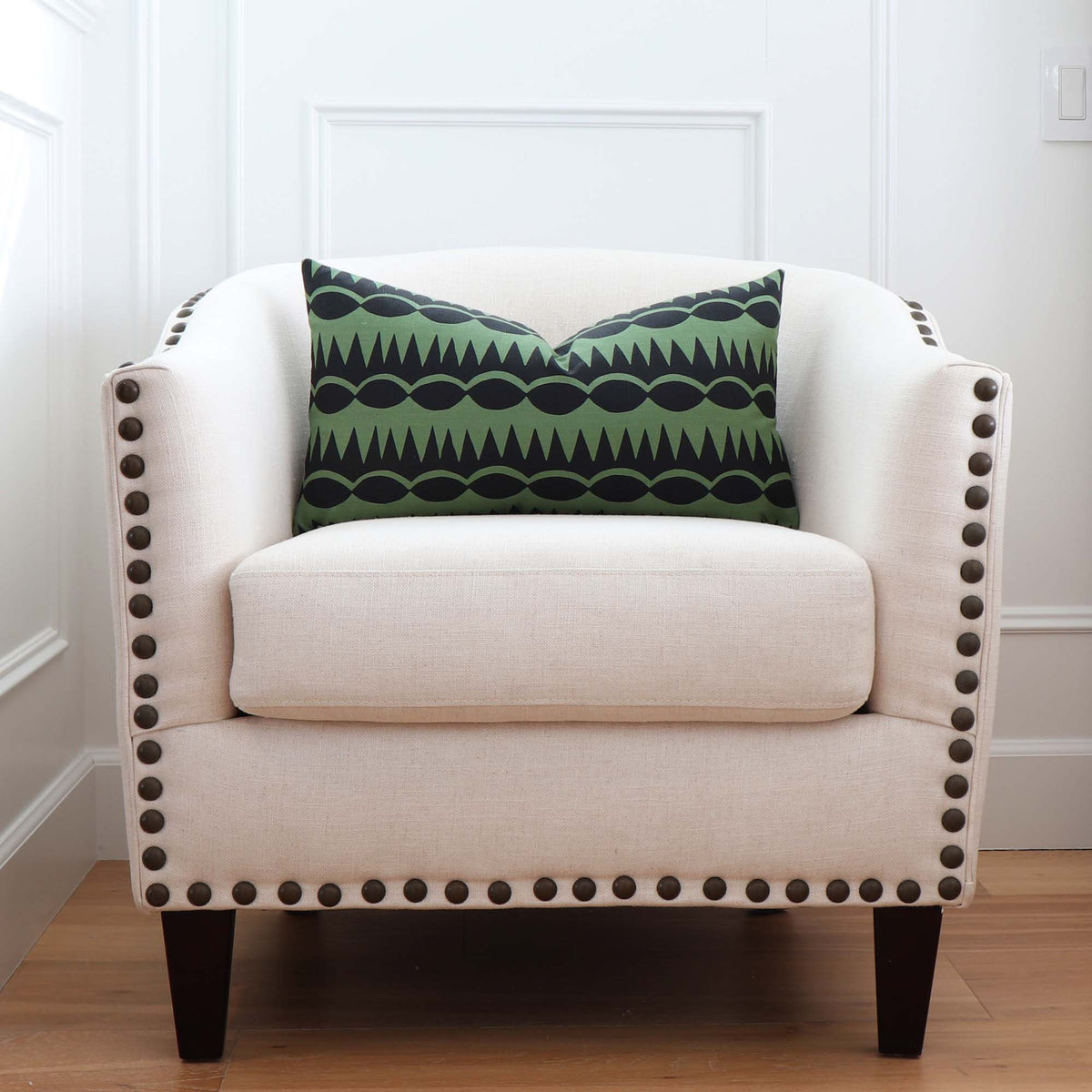 Schumacher Dagger Stripe Green Geometric Stripe Designer Throw Pillow Cover on Accent Chair