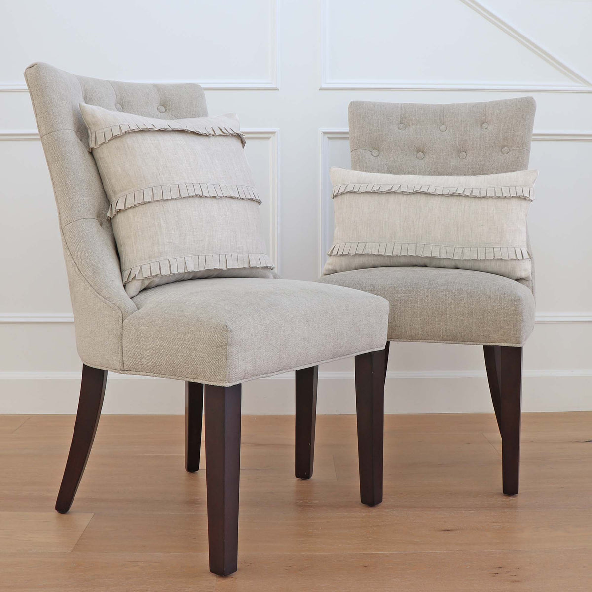 Schumacher Dorothy Pleated Linen Natural Designer Decorative Throw Pillow Cover on Chairs in Home