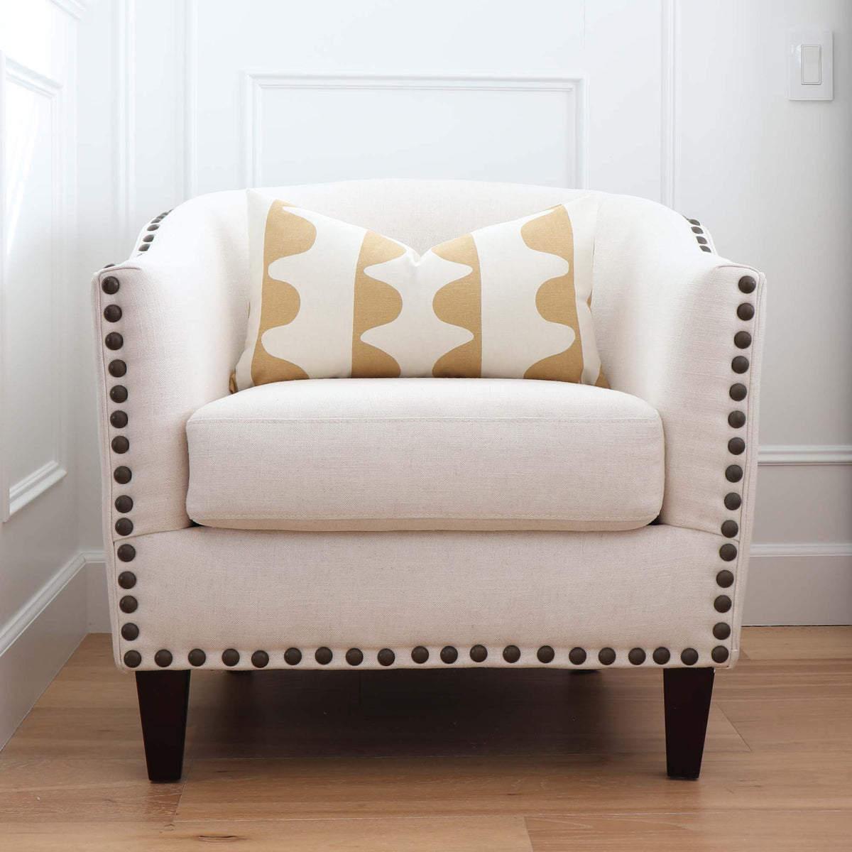 Schumacher Hadiya Williams Drift Ginger Hand Printed Geometric Stripe Luxury Designer Throw Pillow Cover on Accent Chair