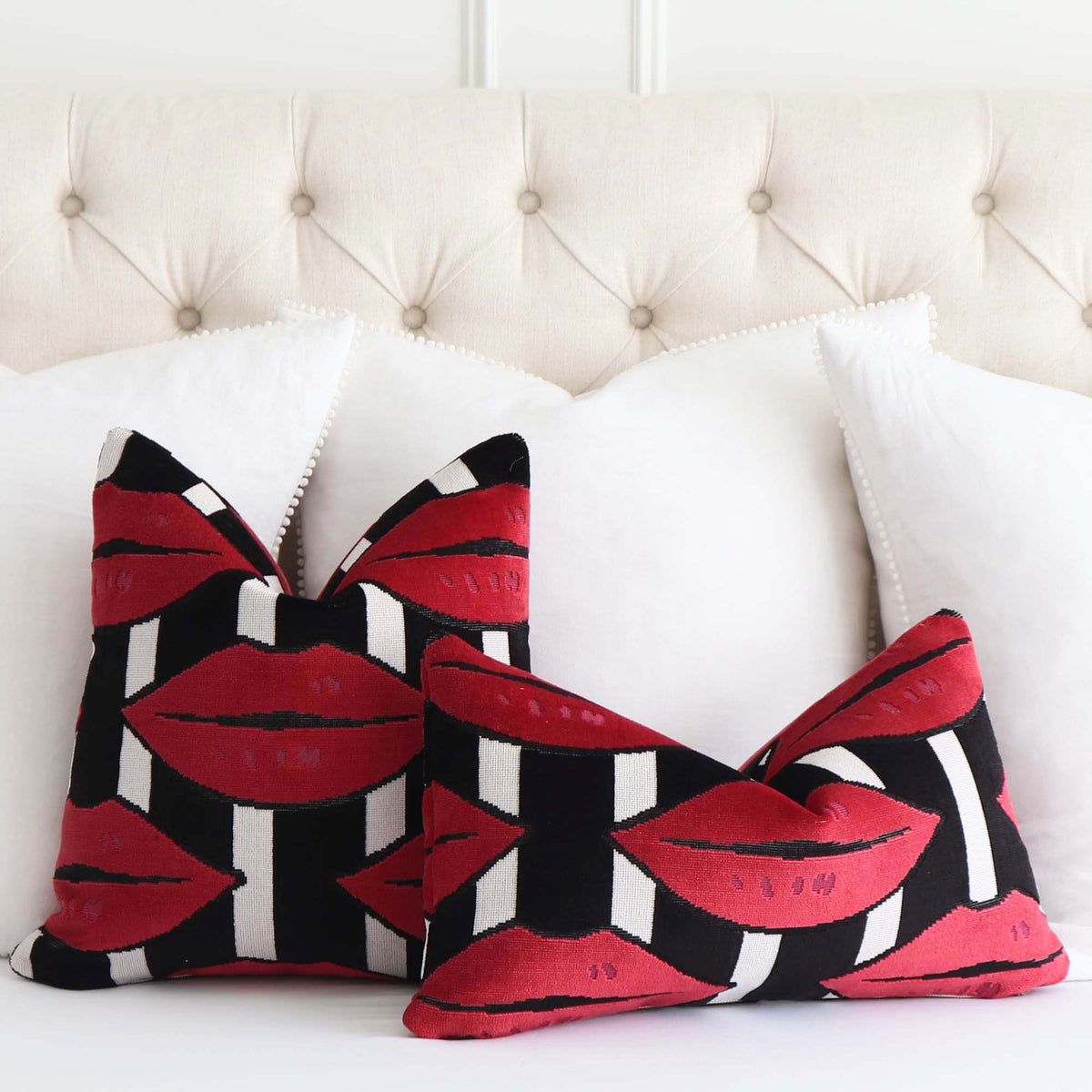 Schumacher Johnson Hartig Amuse Bouche Big Lip Print Throw Pillow Cover in Lipstick Red, Black and White on Bed
