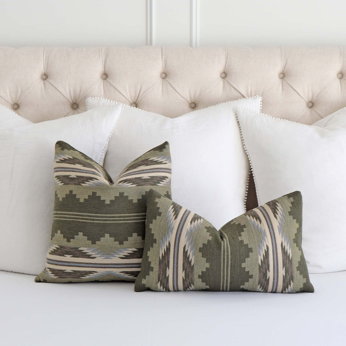 Schumacher Monsoon Green Wool Southwestern Geometric Designer Luxury Throw Pillow Covers with Large White Euro Shams on Bed
