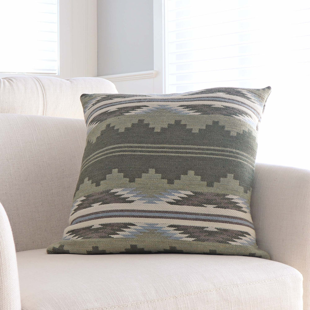 Schumacher Monsoon Green Wool Southwestern Geometric Designer Luxury Throw Pillow Cover on Accent Chair