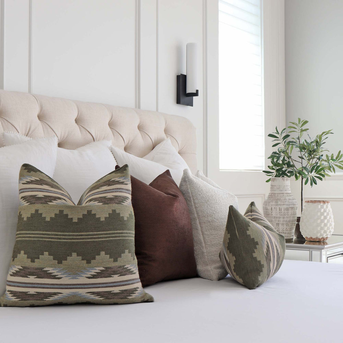 Schumacher Monsoon Green Wool Southwestern Geometric Designer Luxury Throw Pillow Cover with Complementing Throw Pillows In Bedroom