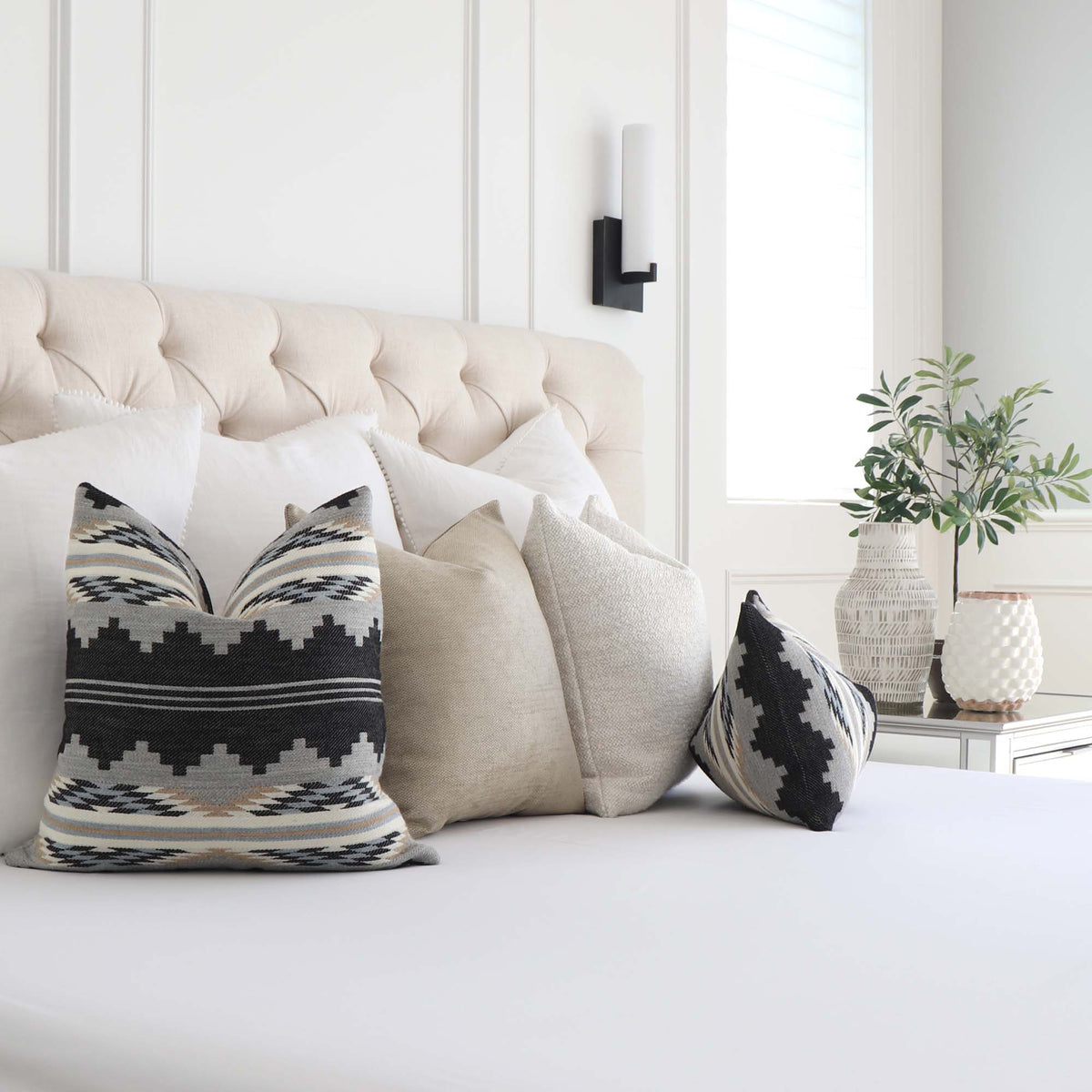 Schumacher Monsoon Navy Blue Wool Southwestern Style Designer Luxury Geometric Throw Pillow Cover with Matching Throw Pillows in Bedroom