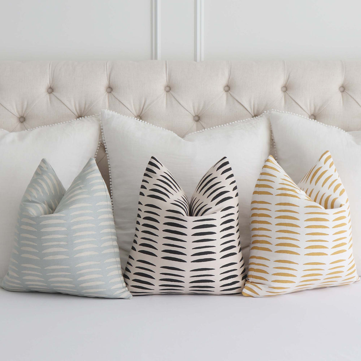 Schumacher Hadiya Williams Parable Luxury Decorative throw pillows on Bed