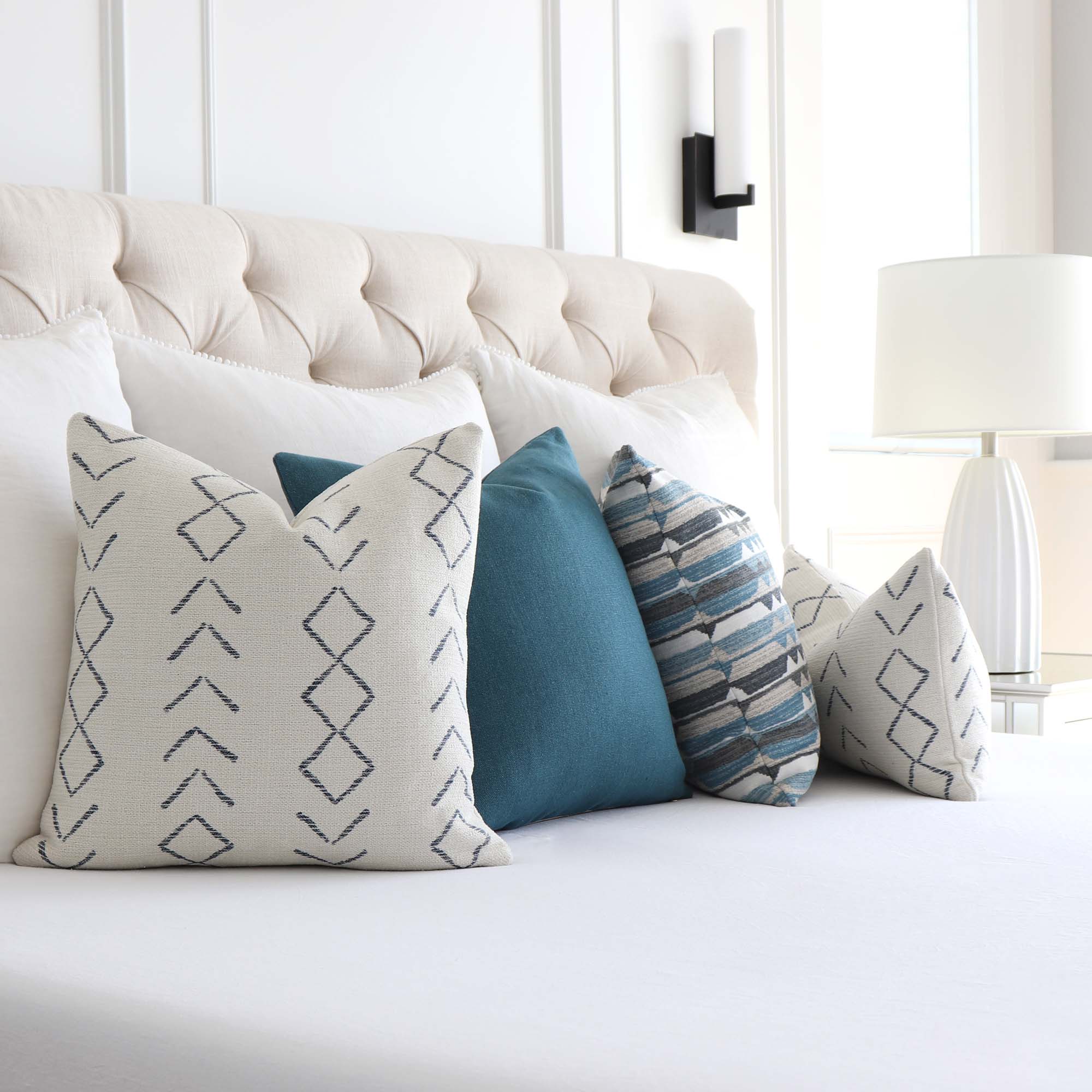https://www.chloeandolive.com/cdn/shop/files/Thibaut_InsideOut_Performance_Fabric_Anasazi_Midnight_Blue_Woven_Striped_Designer_Luxury_Throw_Pillow_Cover_with_Coordinating_Throw_Pillows_5000x.jpg?v=1692552582