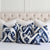 Thibaut Indies Ikat Navy Large Scale Bold Graphic Designer Decorative Throw Pillow Cover v.1 with Various Pattern Placement on Bed