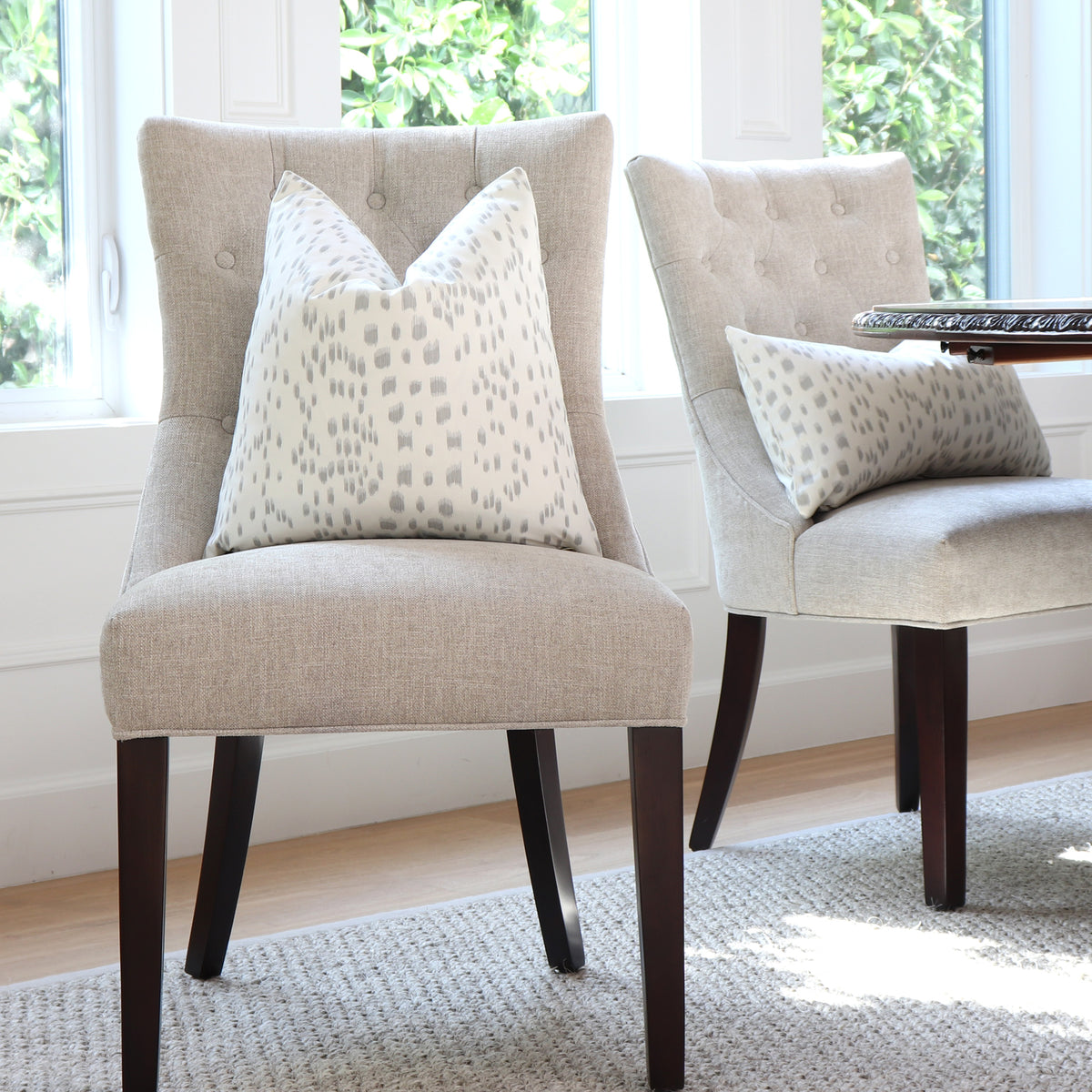 Les Touches Grey Throw Pillow Cover on Accent Chair