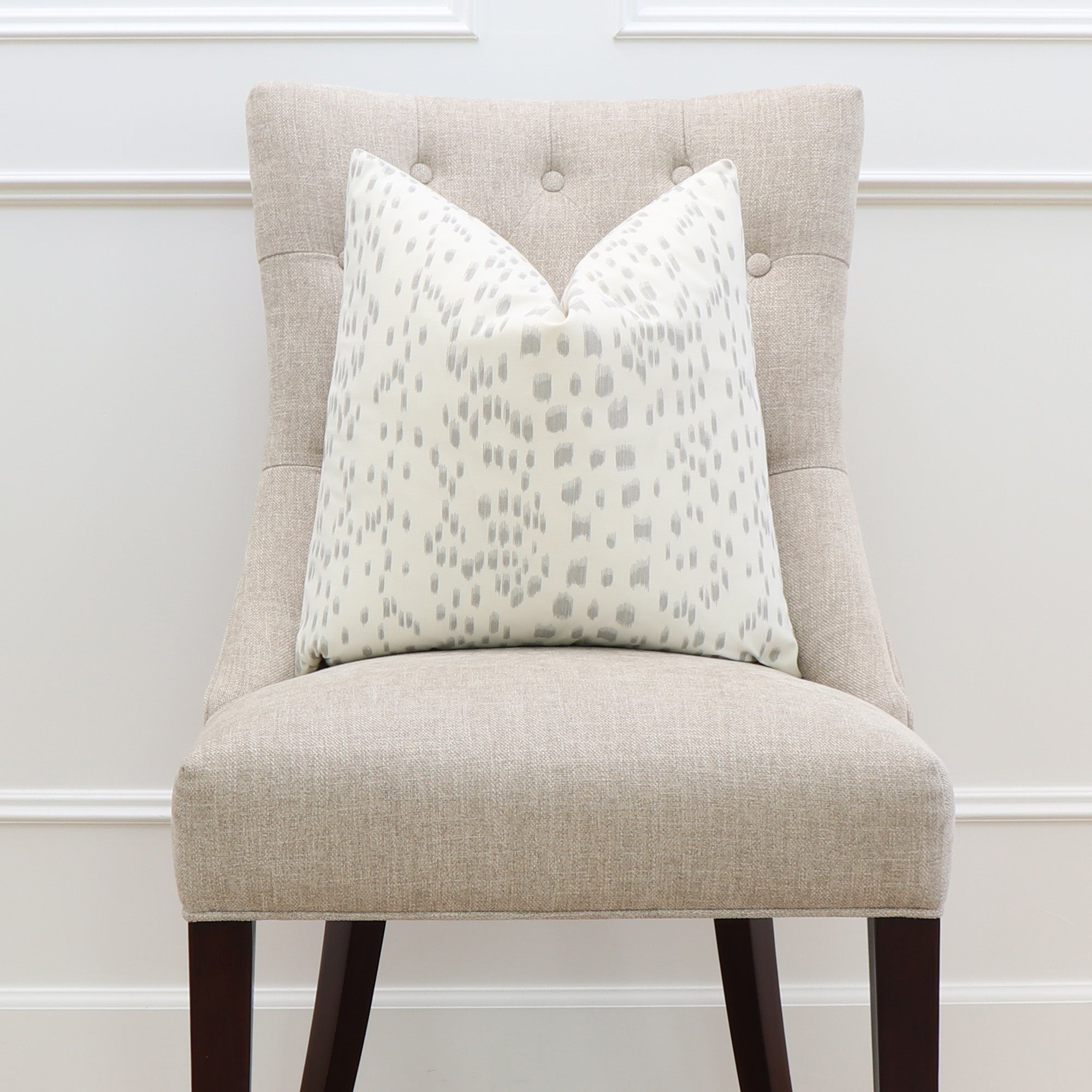 Les Touches Grey Throw Pillow Cover on Dining Chair
