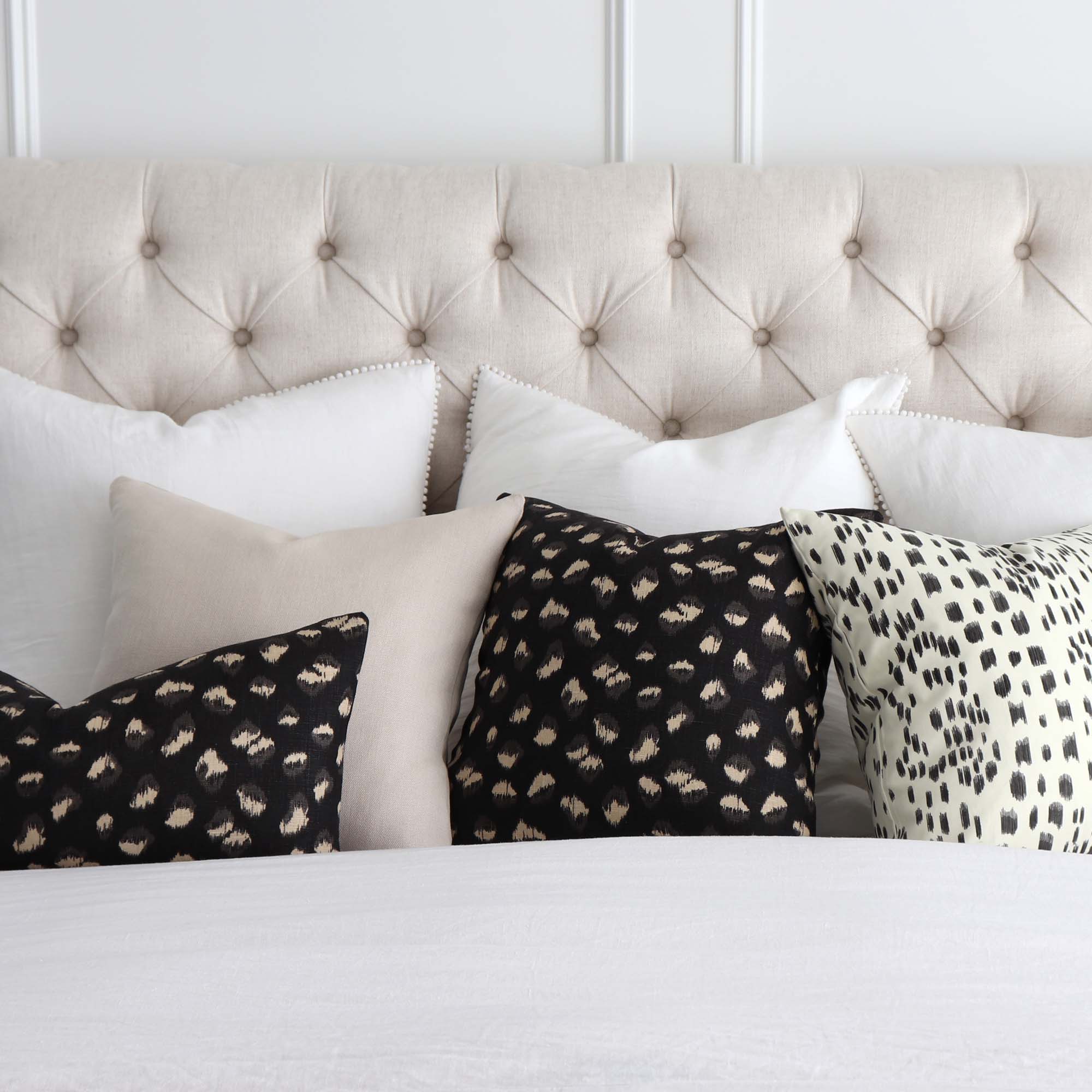 Kelly Wearstler Feline Cheetah Ebony Beige Designer Throw Pillow Cover on King Size Bed