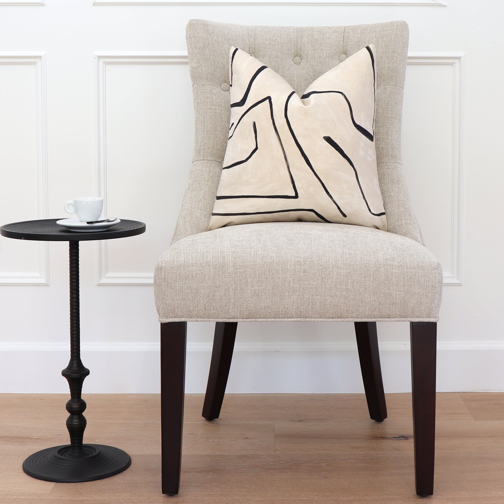 Kelly Wearstler Graffito Linen Onyx Designer Throw Pillow on Dining Chair