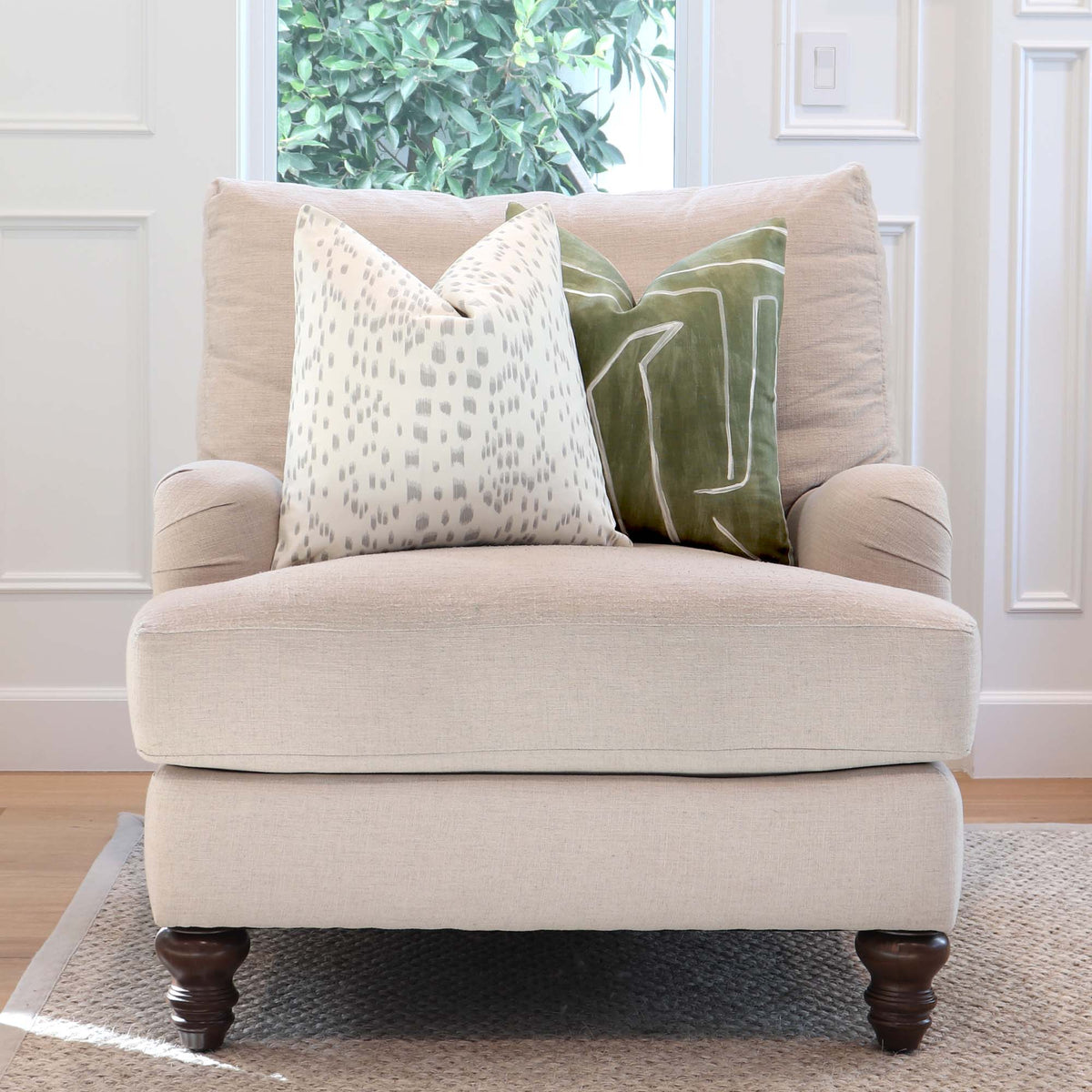 Kelly Wearstler Graffito Fern Green Designer Throw Pillow Cover on Arm Chair in Living Room of Home