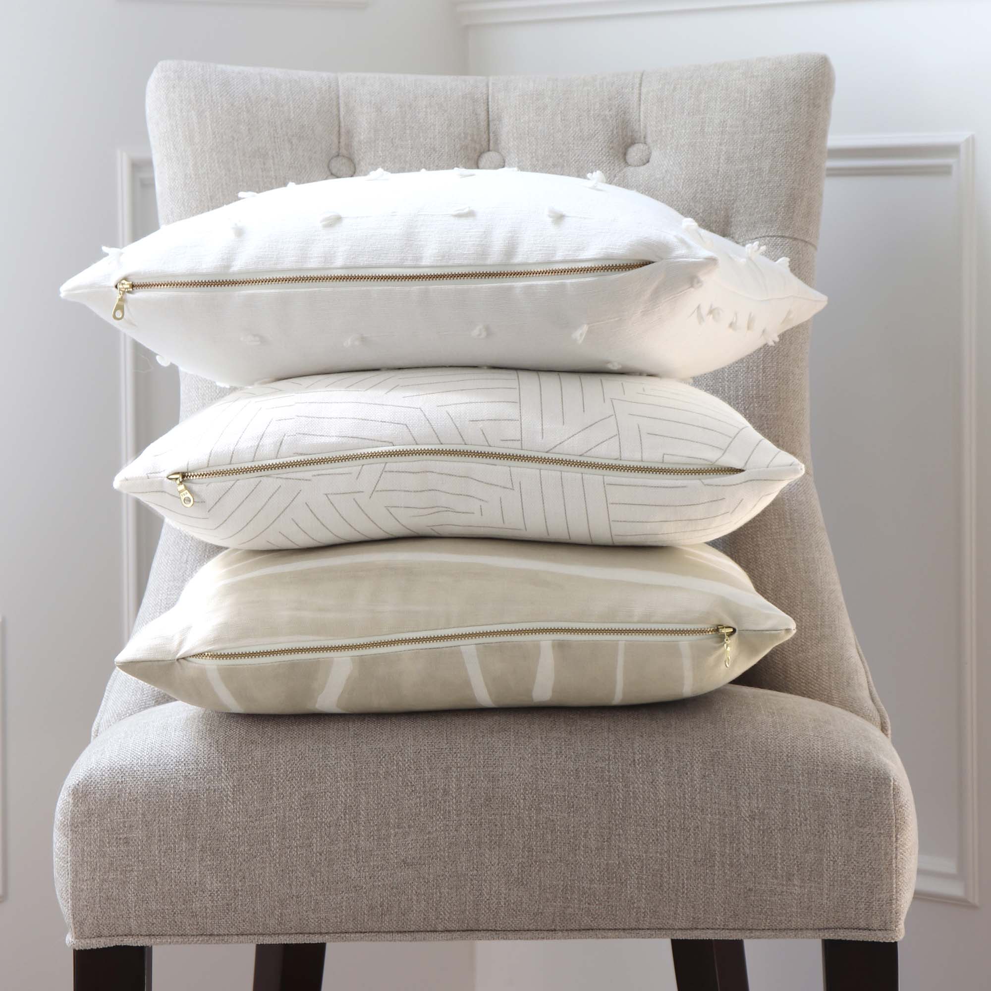 https://www.chloeandolive.com/cdn/shop/products/Graffito_Kelly_Wearstler_Beige_Ivory_Decorative_Designer_Throw_Pillow_Cover_with_Matching_Pillows_5000x.jpg?v=1602737786