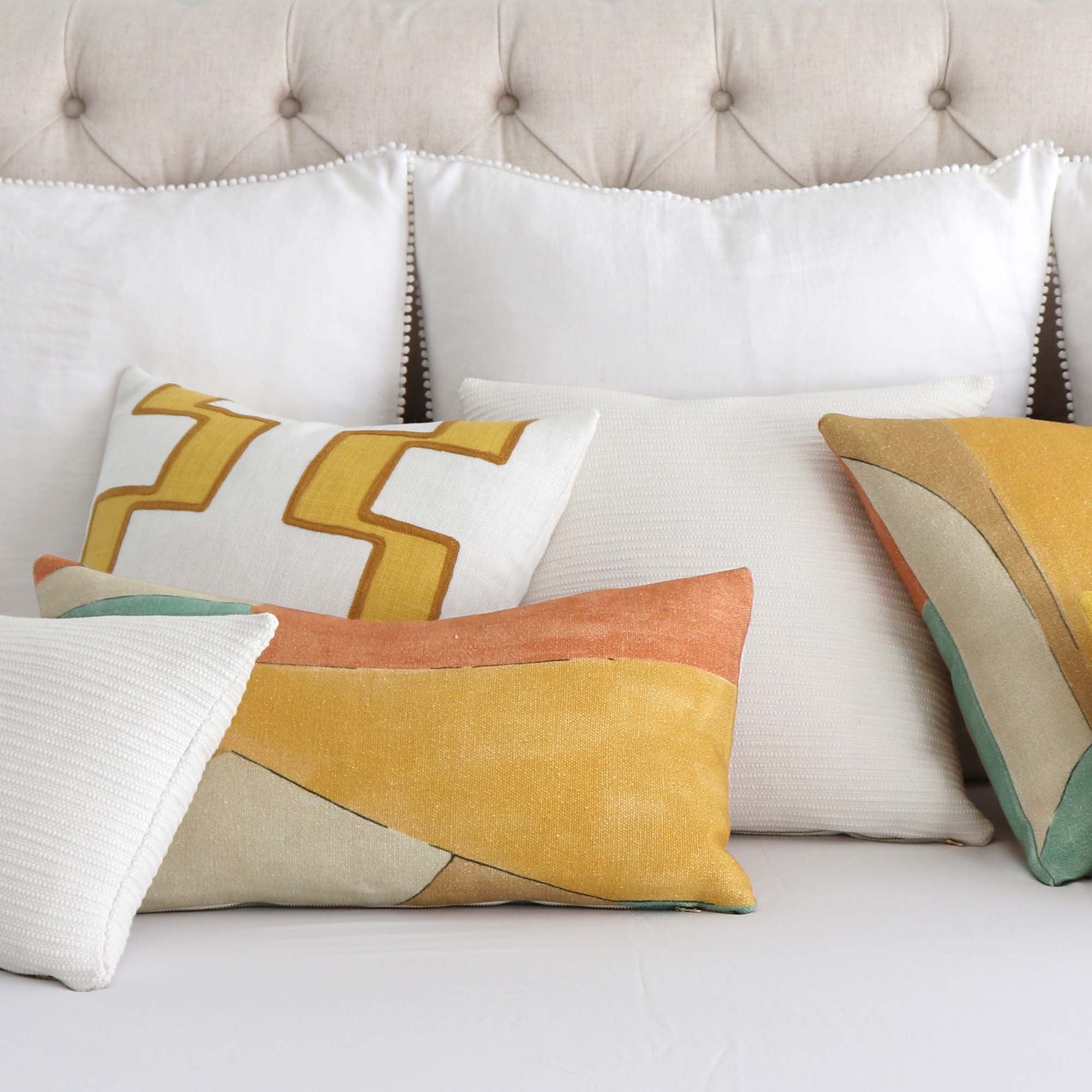 https://www.chloeandolive.com/cdn/shop/products/Kelly-Wearstler-District-134-Tawny-Designer-Luxury-Decorative-Throw-Pillow-Cover_scenic_bed_pillowscape_5000x.jpg?v=1632497998