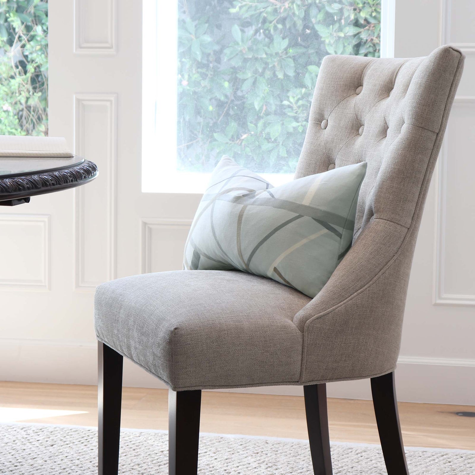 Kelly Wearstler Simpatico Cinder Light Blue Striped Designer Decorative Lumbar Throw Pillow Cover on Chair in Dining Room