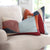 Kelly Wearstler District Claret Geometric Designer Throw Pillow Cover on Comfy Arm Chair in Living Room