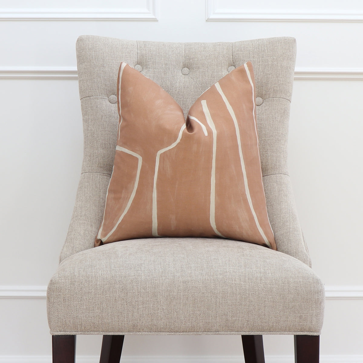 Kelly Wrestler Graffito Salmon Throw Pillow Cover on Accent Chair