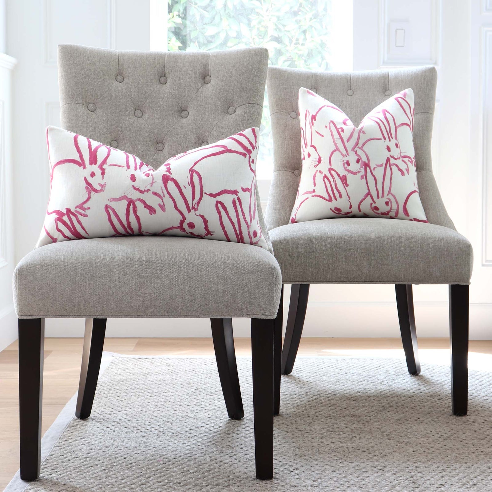 Lee Jofa Groundworks Hutch Pink Bunny Designer Throw Pillow Cover on Dining Chairs in Home Decor