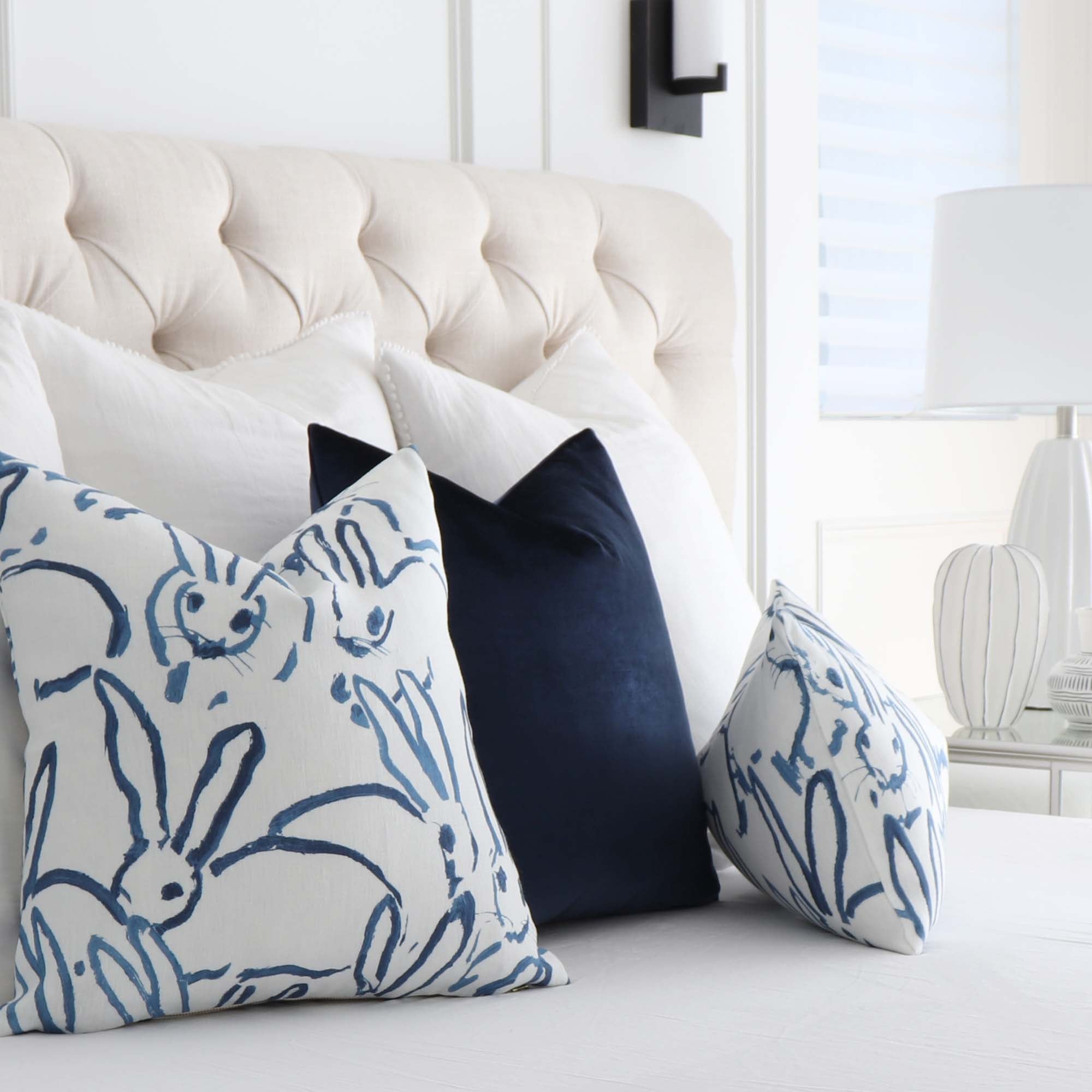 https://www.chloeandolive.com/cdn/shop/products/Lee-Jofa-Groundworks-Hutch-Bunny-Navy-Blue-Designer-Luxury-Throw-Pillow-Cover-GWF3523-with-Blue-Velvet-Matching-Pillow_2000x.jpg?v=1618019202