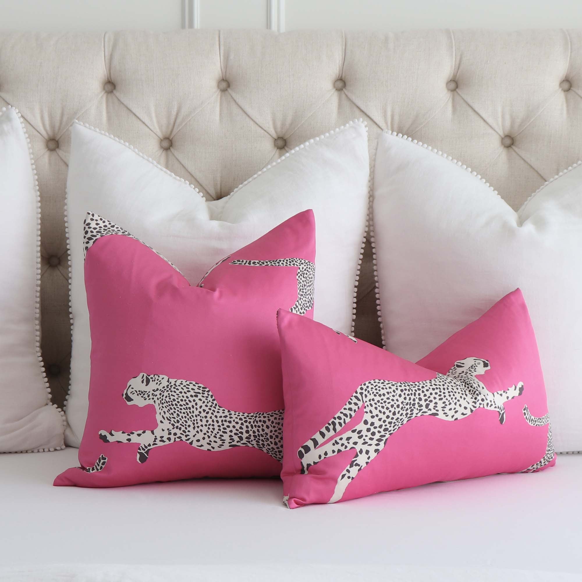 https://www.chloeandolive.com/cdn/shop/products/Scalamandre-Leaping-Cheetah-Bubblegum-Pink-SC000316634-Animal-Print-Designer-Luxury-Decorative-Throw-Pillow-Cover_scenic_bed_2000x.jpg?v=1652412824