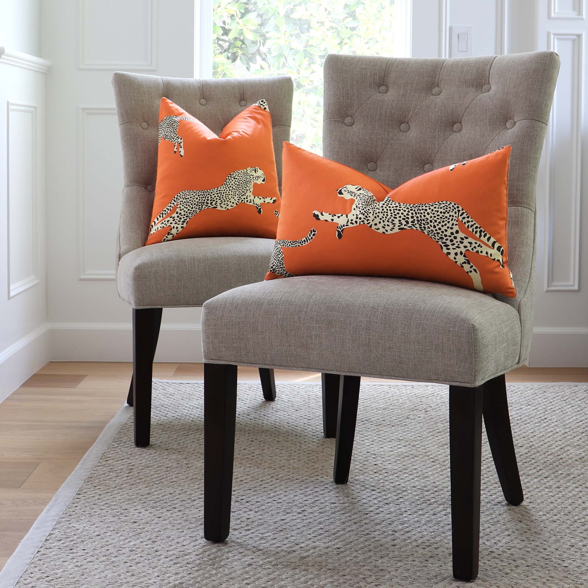 Scalamandre Leaping Cheetah Clementine Orange Luxury Throw Pillow Cover on Dining Chairs in Home