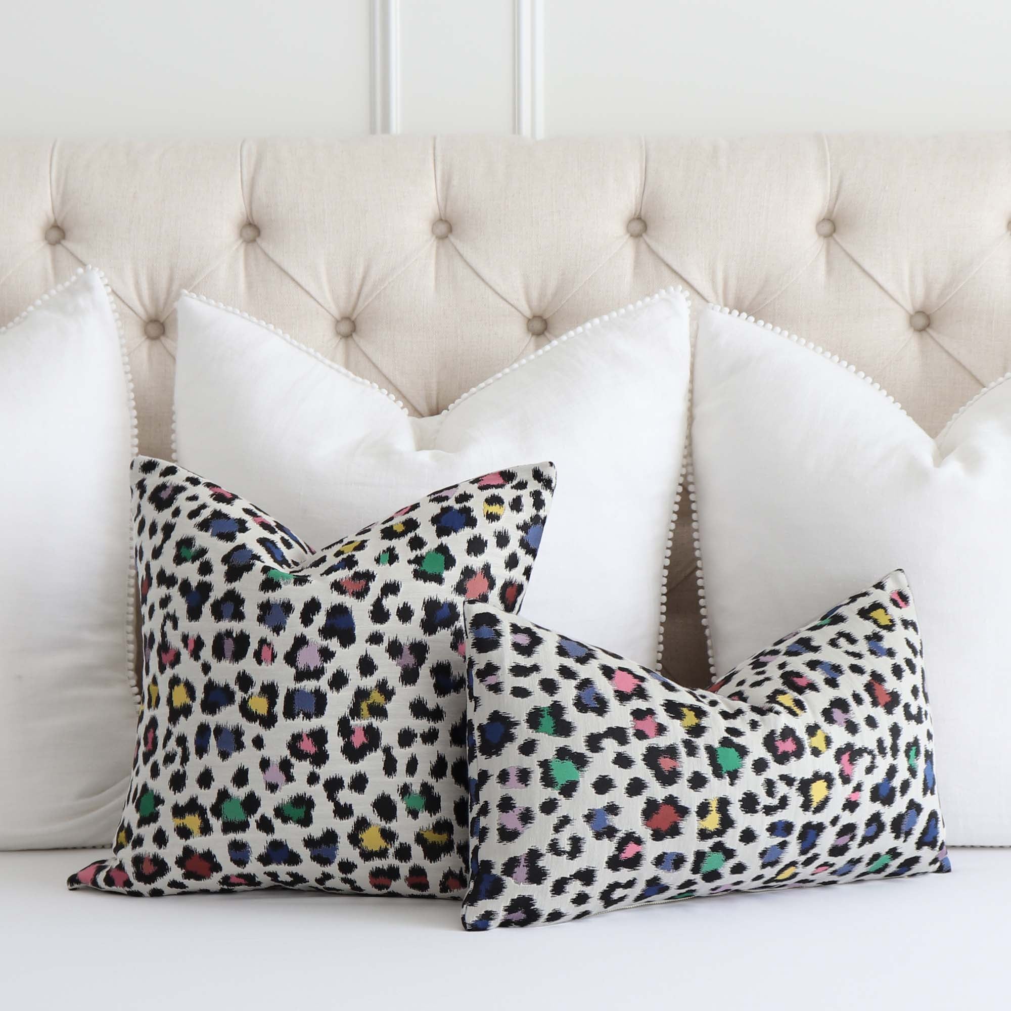 https://www.chloeandolive.com/cdn/shop/products/Scalamandre-Rosette-Disco-Woven-Colorful-Animal-Print-Designer-Luxury-Decorative-Throw-Pillow-Cover_scenic_bed_5000x.jpg?v=1652326720