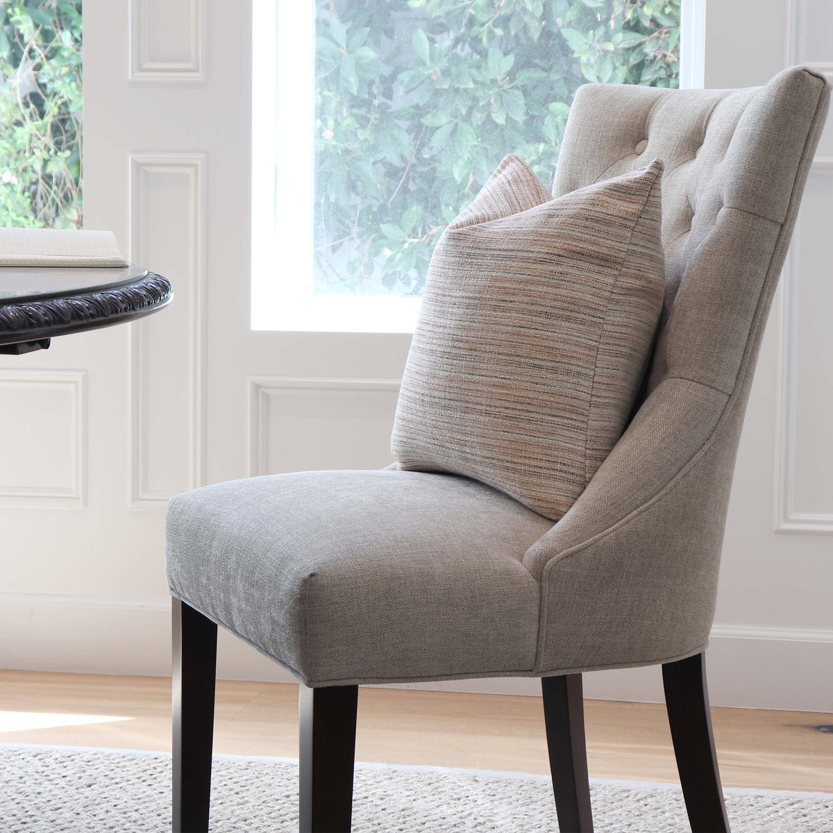 Schumacher Formentera Performance Blush Textured Designer Square Throw Pillow  on Chair in Home