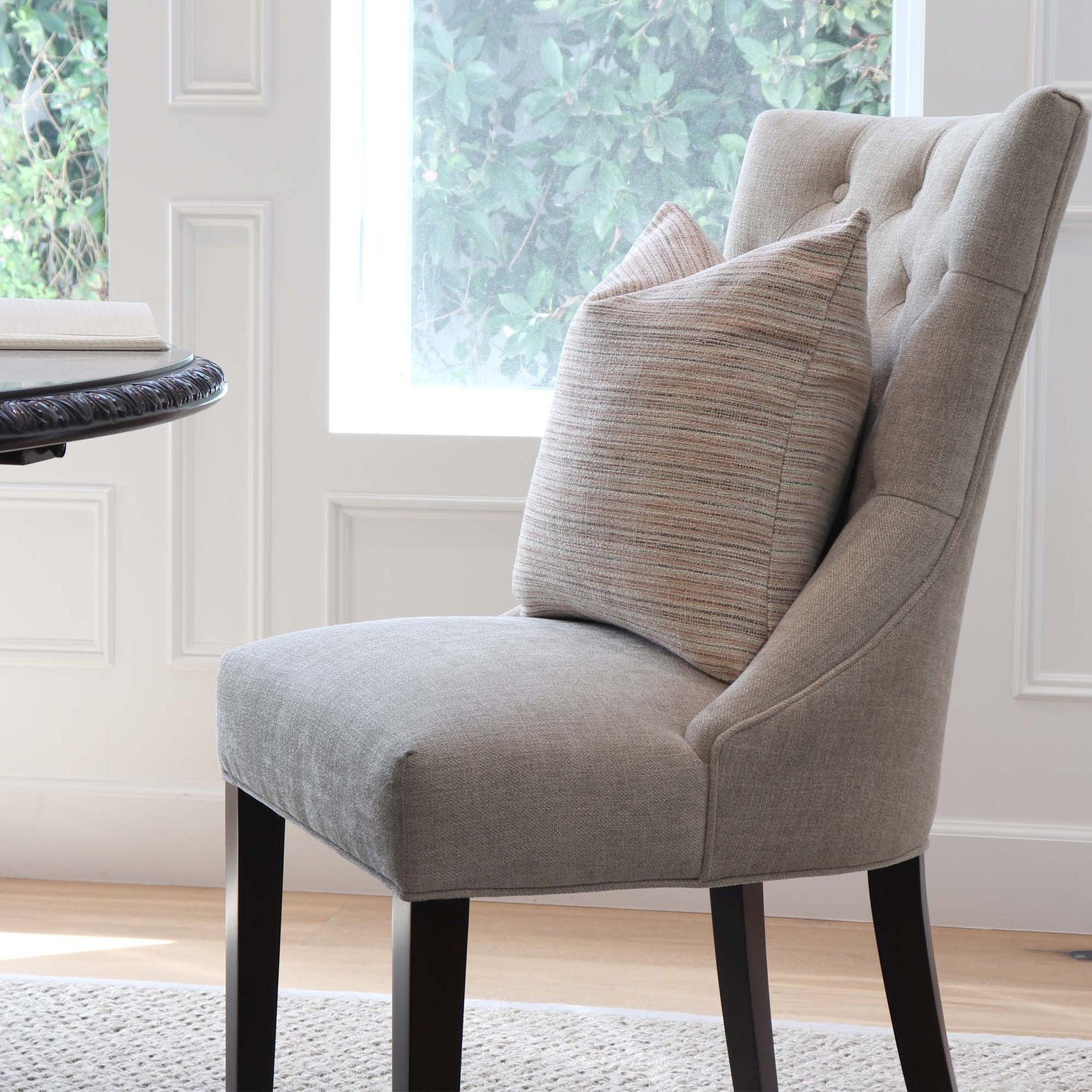 Schumacher Formentera Performance Blush Textured Designer Square Throw Pillow  on Chair in Home